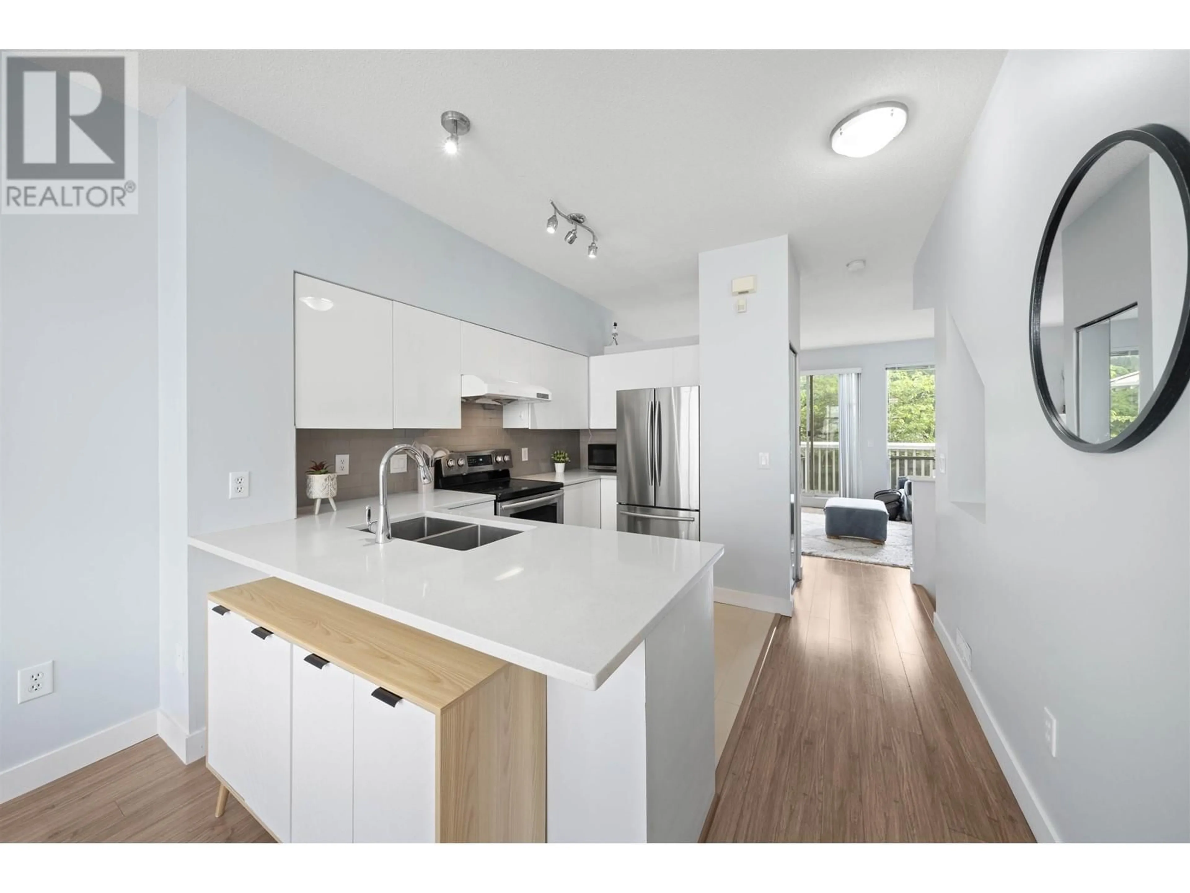 Open concept kitchen, wood/laminate floor for 7 - 12920 JACK BELL DRIVE, Richmond British Columbia V6V2V9
