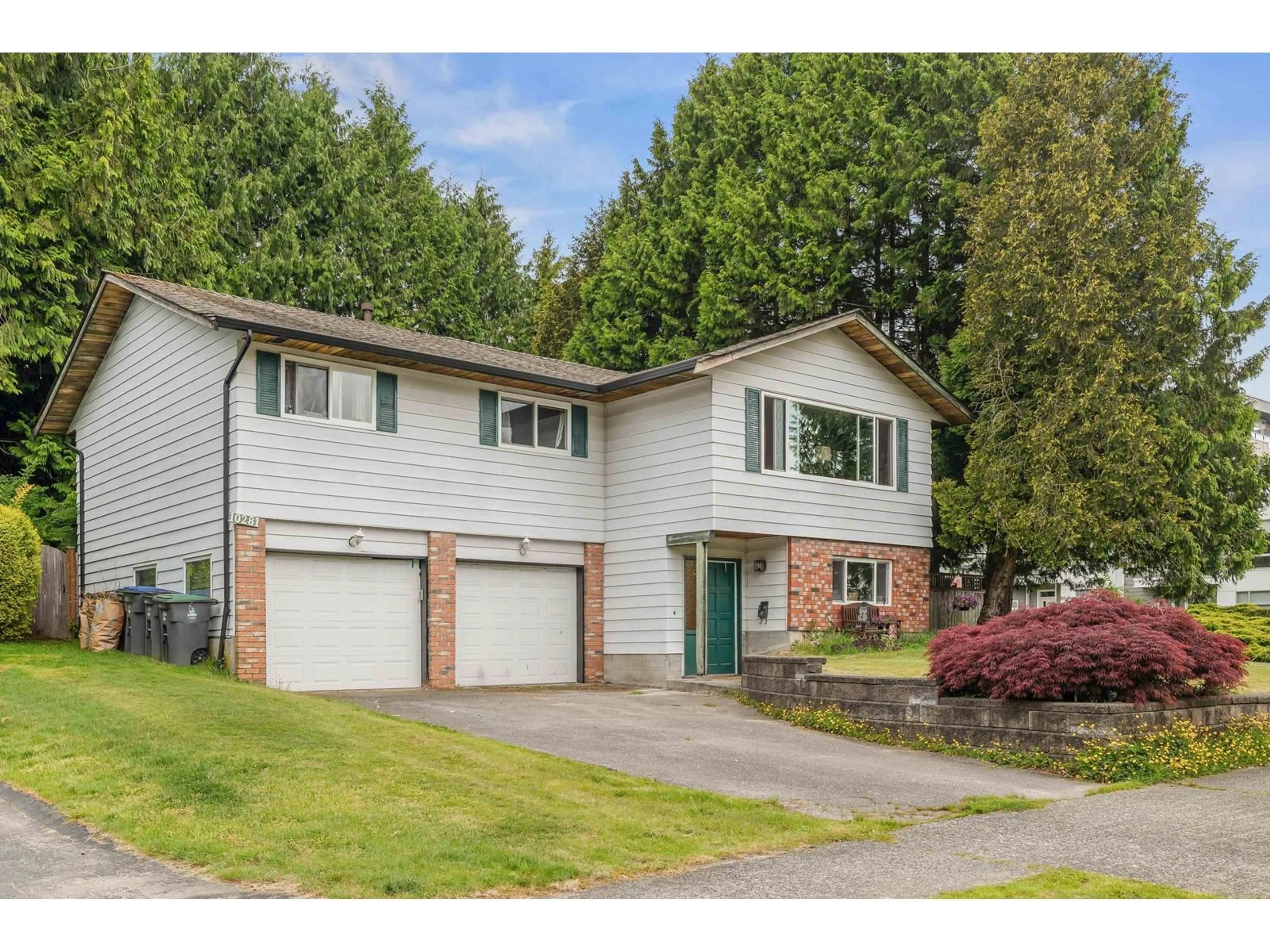 Home with vinyl exterior material, street for 10281 145, Surrey British Columbia V3R3R5