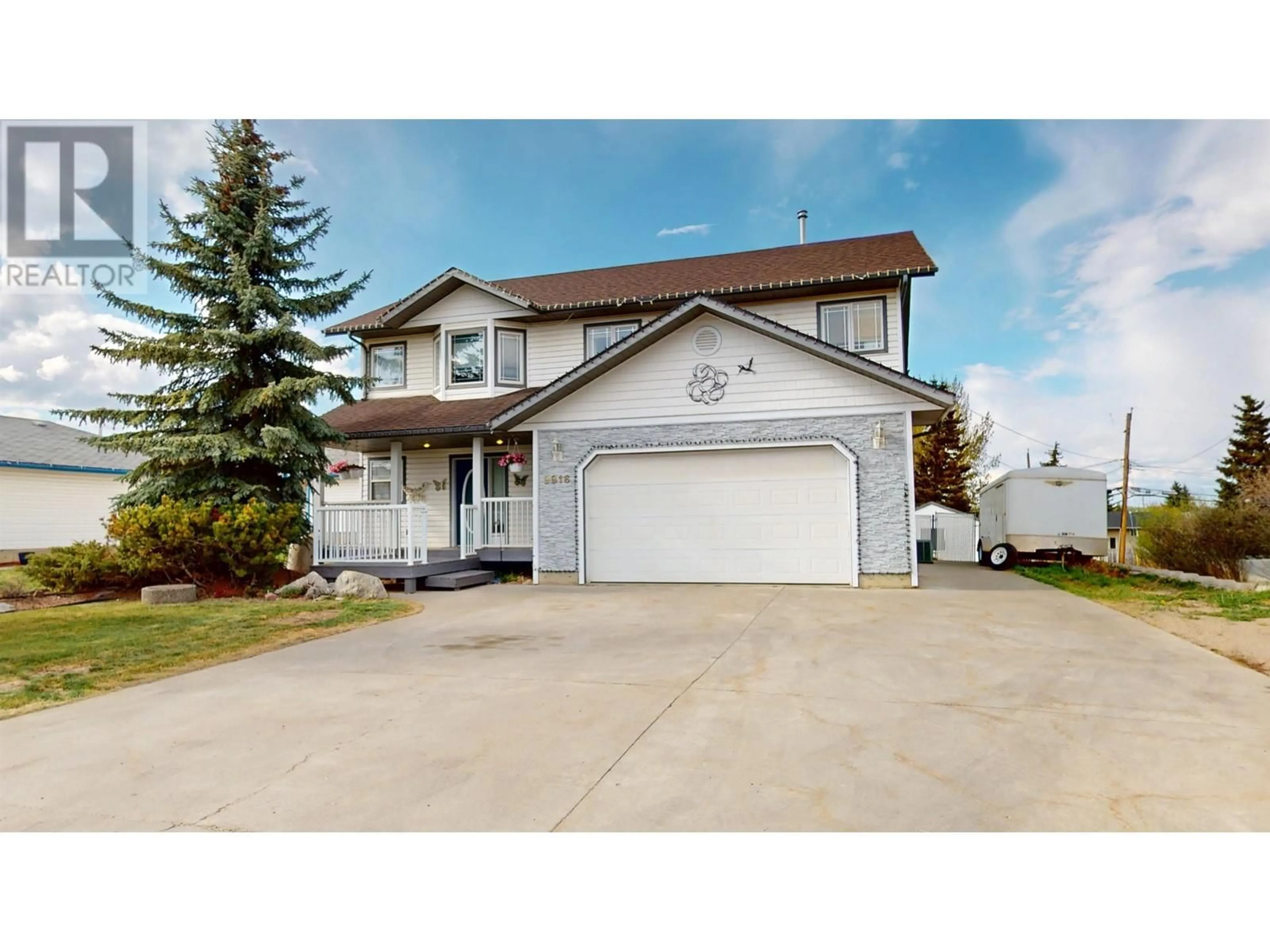 Home with vinyl exterior material, street for 9916 112 AVENUE, Fort St. John British Columbia V1J3Z1