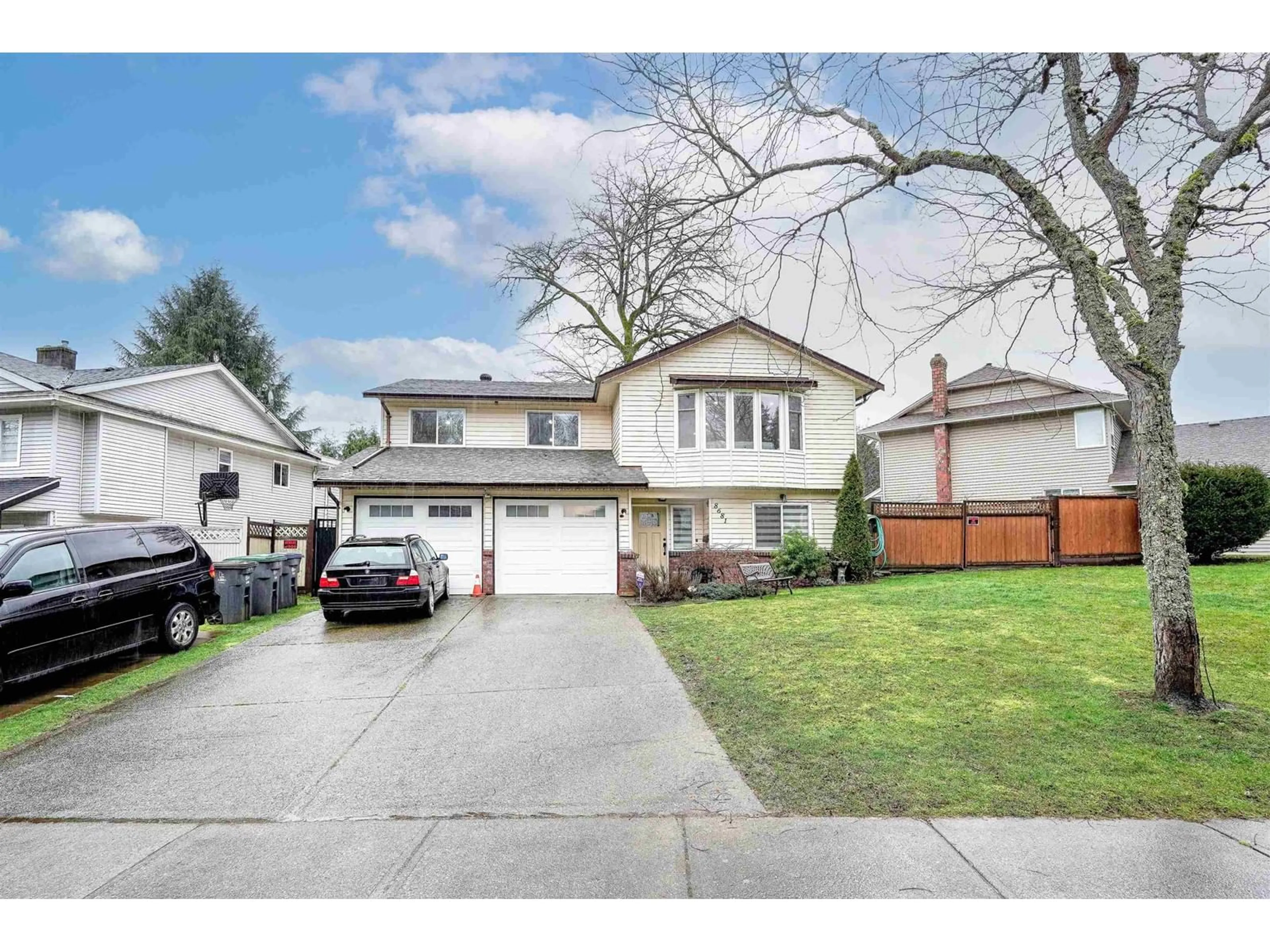 Home with vinyl exterior material, street for 8681 146A, Surrey British Columbia V3S6N7