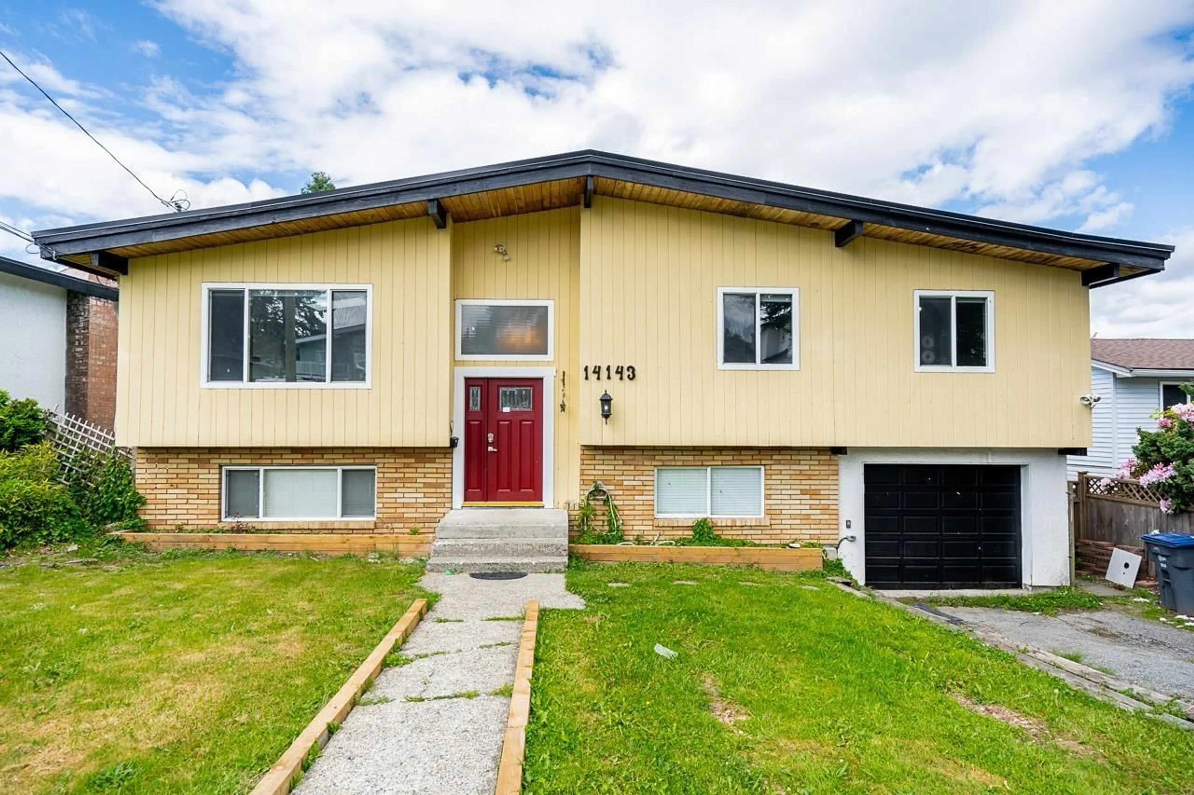 Home with brick exterior material, street for 14143 77A, Surrey British Columbia V3W2X2