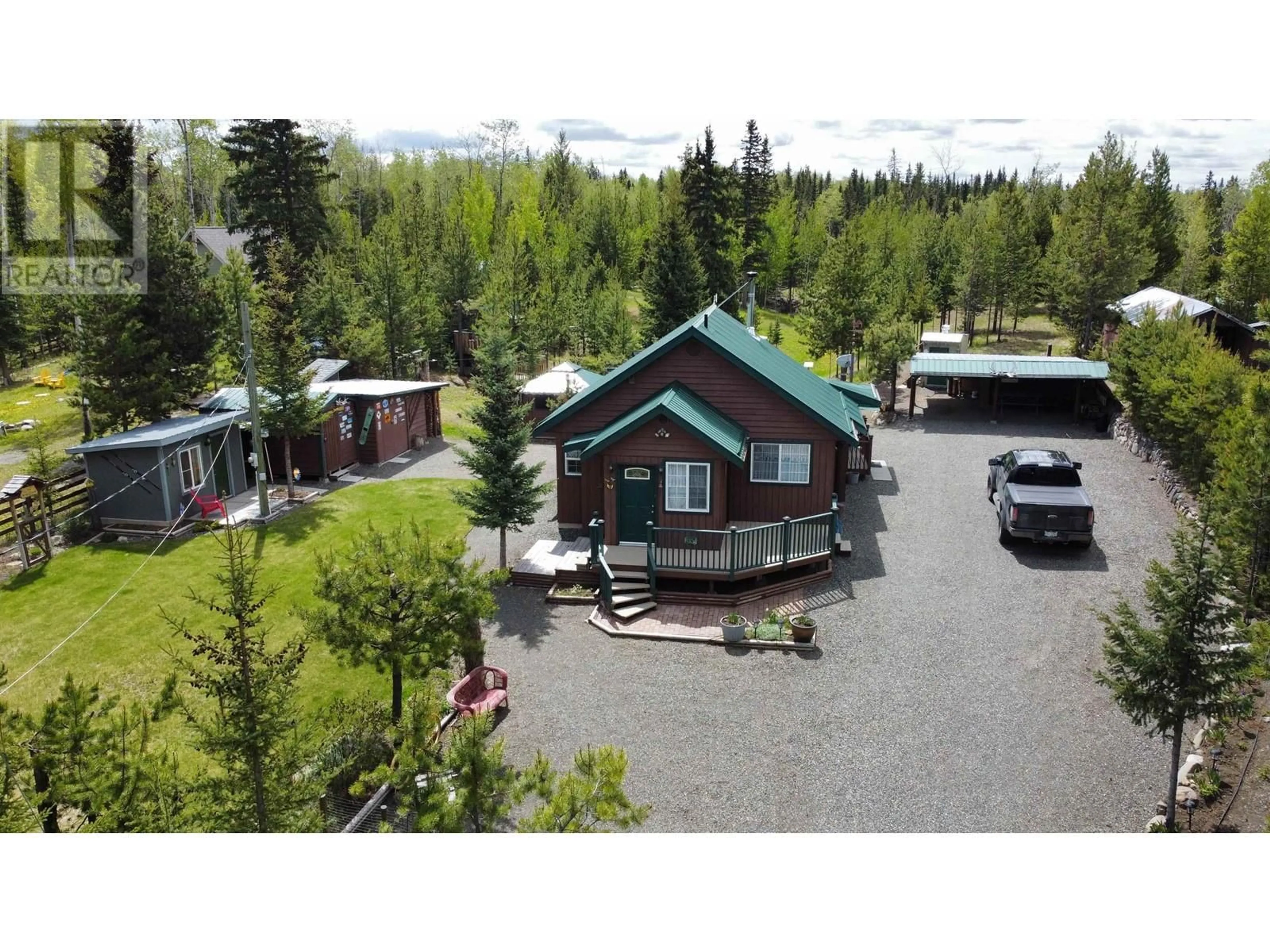 A pic from outside/outdoor area/front of a property/back of a property/a pic from drone, mountain view for 6308 MOOSE POINT DRIVE, 70 Mile House British Columbia V0K2K1