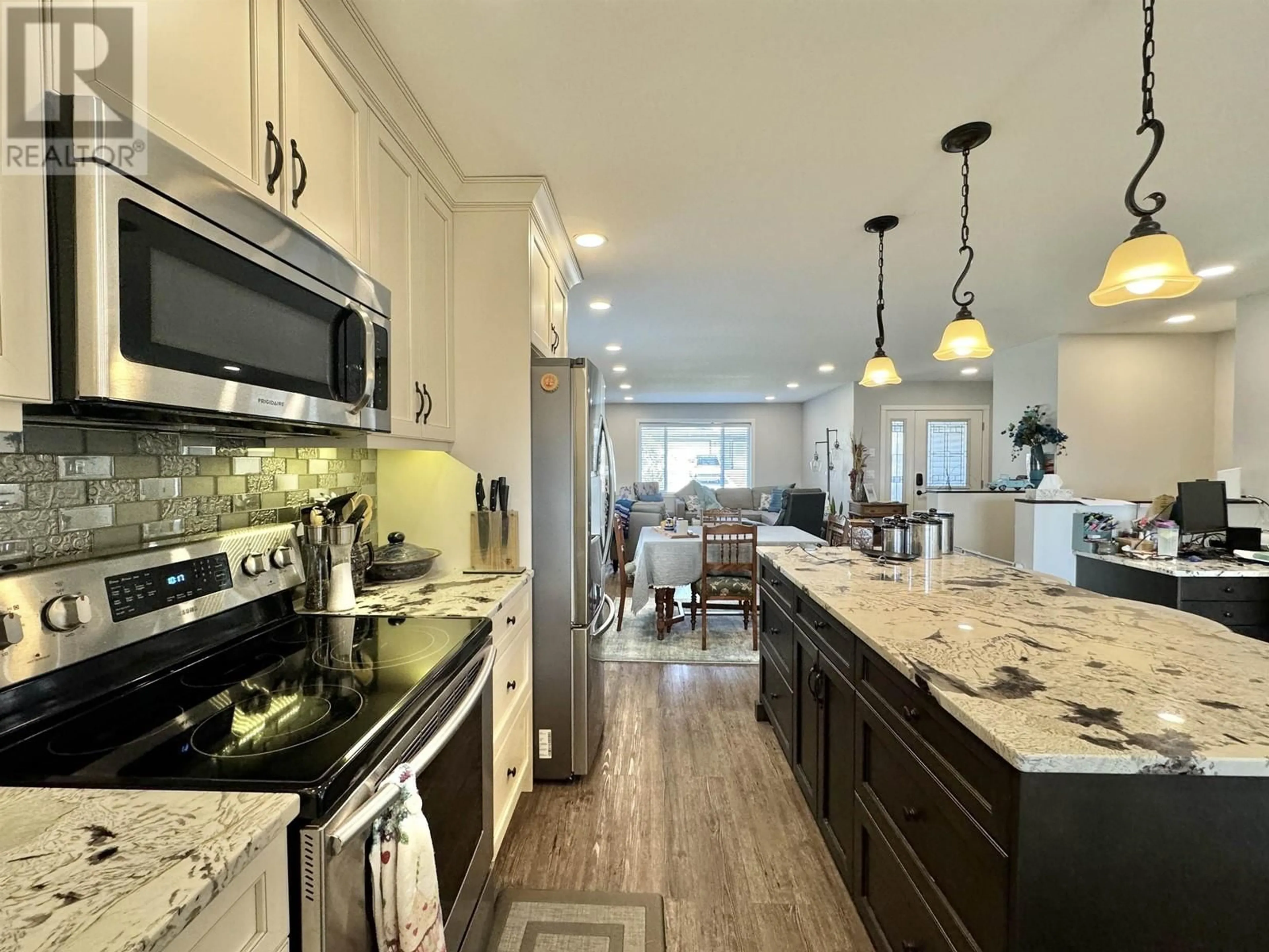 Open concept kitchen, ceramic/tile floor for 127 - 375 MANDARINO PLACE, Williams Lake British Columbia V2G4V3