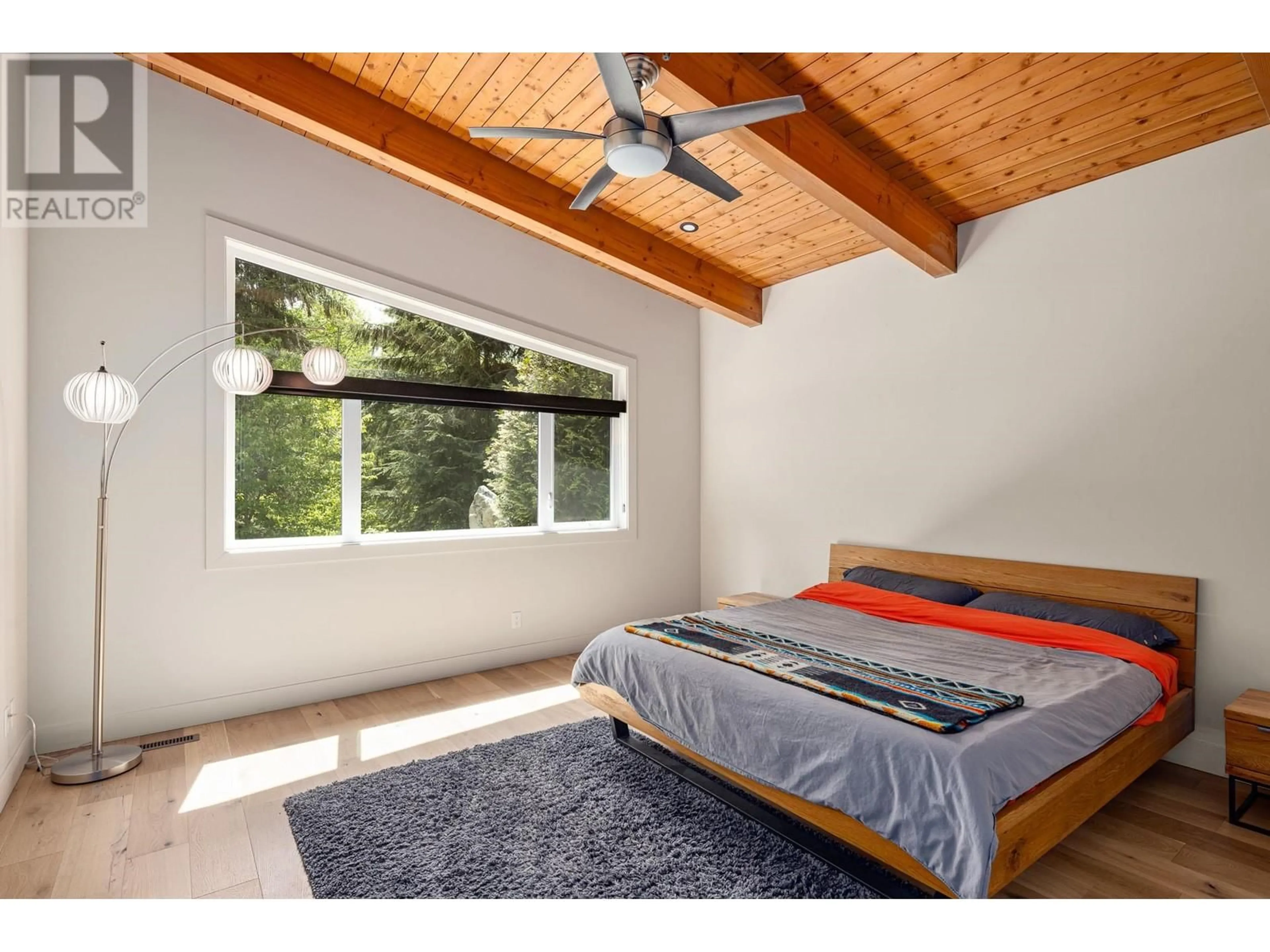 Bedroom with bed, wood/laminate floor for 3308 MAMQUAM ROAD, Squamish British Columbia V8B0S6