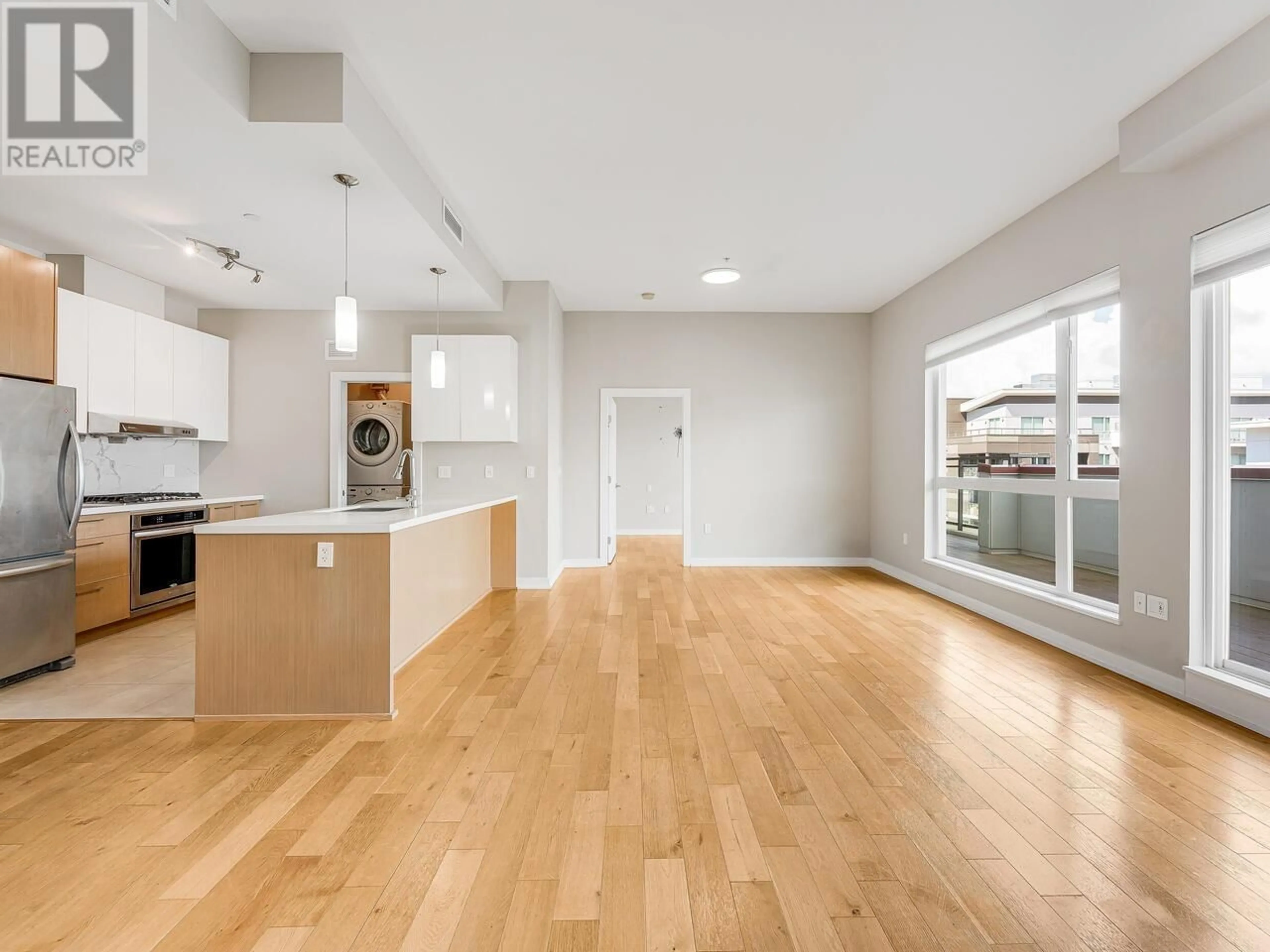 Open concept kitchen, wood/laminate floor for 611 - 5399 CEDARBRIDGE WAY, Richmond British Columbia V6X0L6