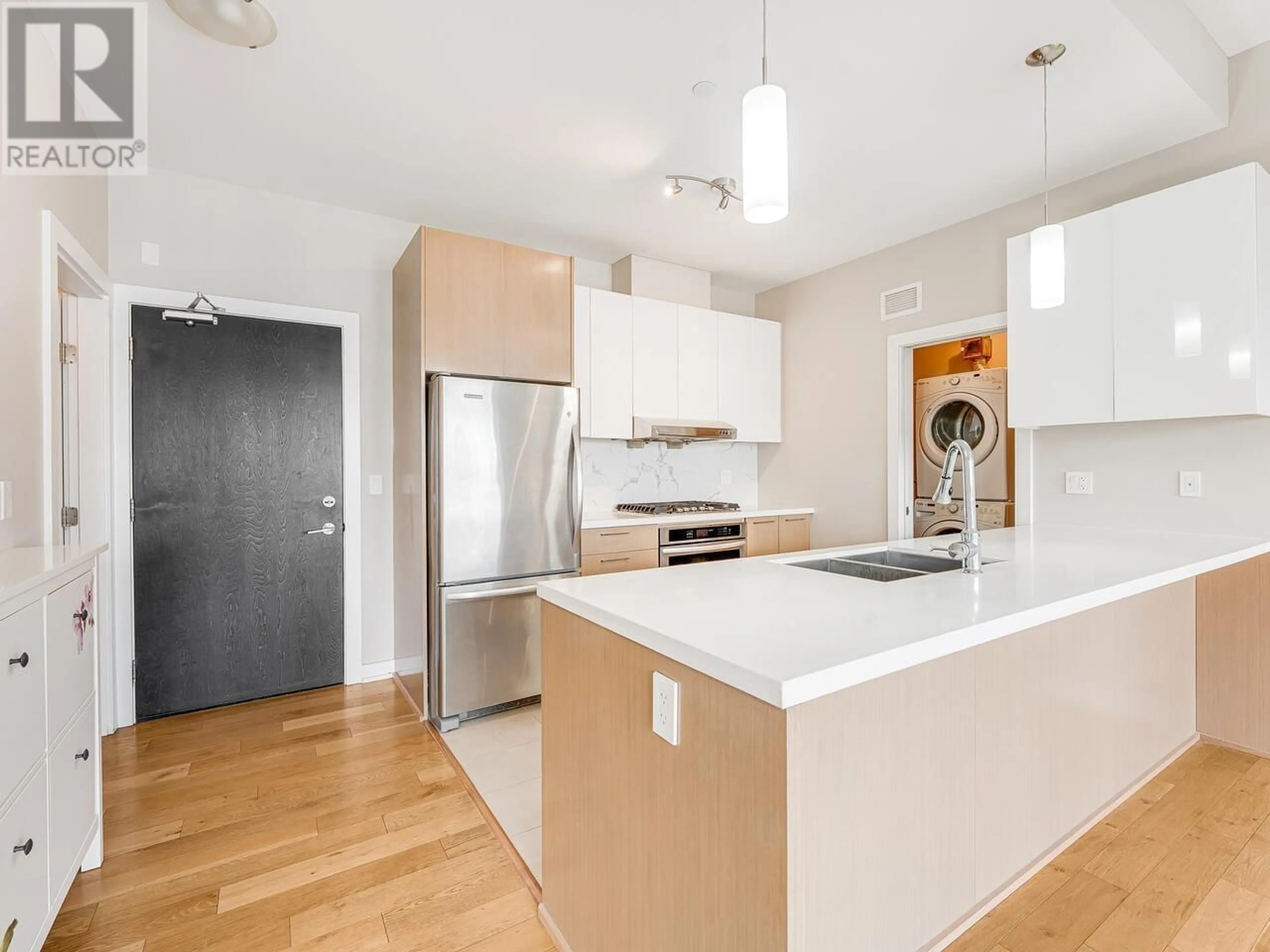 Open concept kitchen, unknown for 611 - 5399 CEDARBRIDGE WAY, Richmond British Columbia V6X0L6