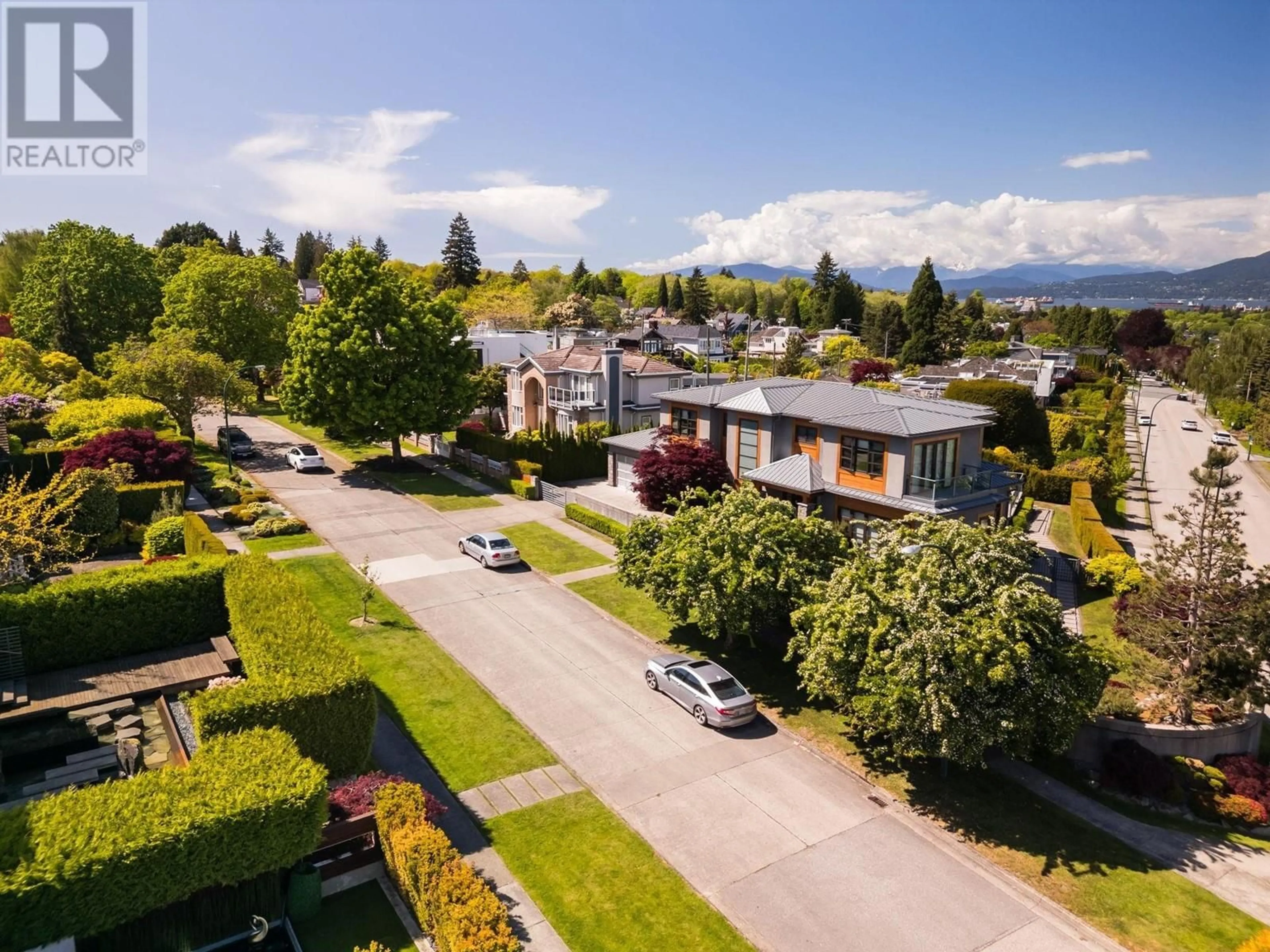 A pic from outside/outdoor area/front of a property/back of a property/a pic from drone, mountain view for 2912 27TH AVENUE, Vancouver British Columbia V6L1W3