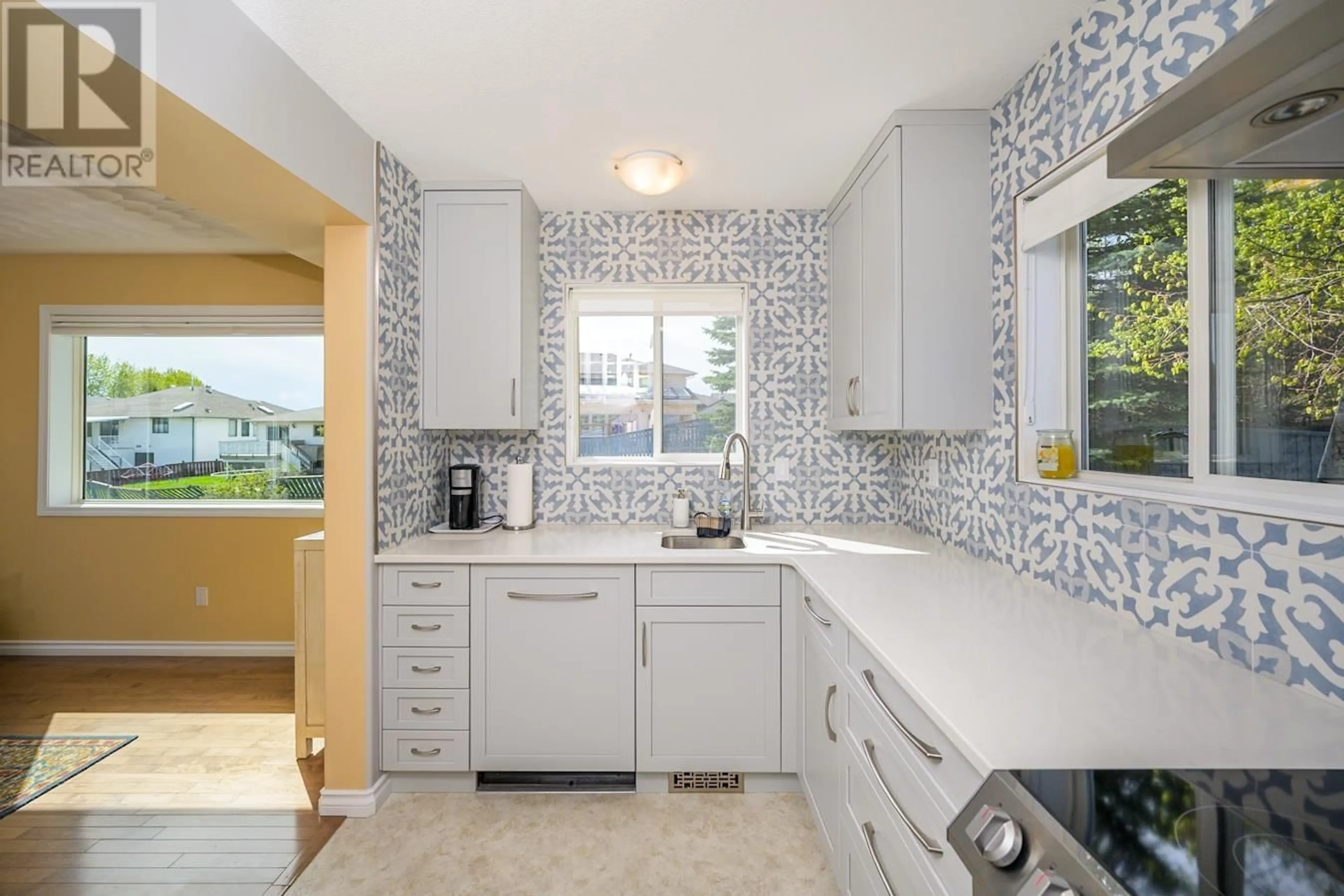 Contemporary kitchen, ceramic/tile floor for 101 - 4281 BAKER ROAD, Prince George British Columbia V2N6M8