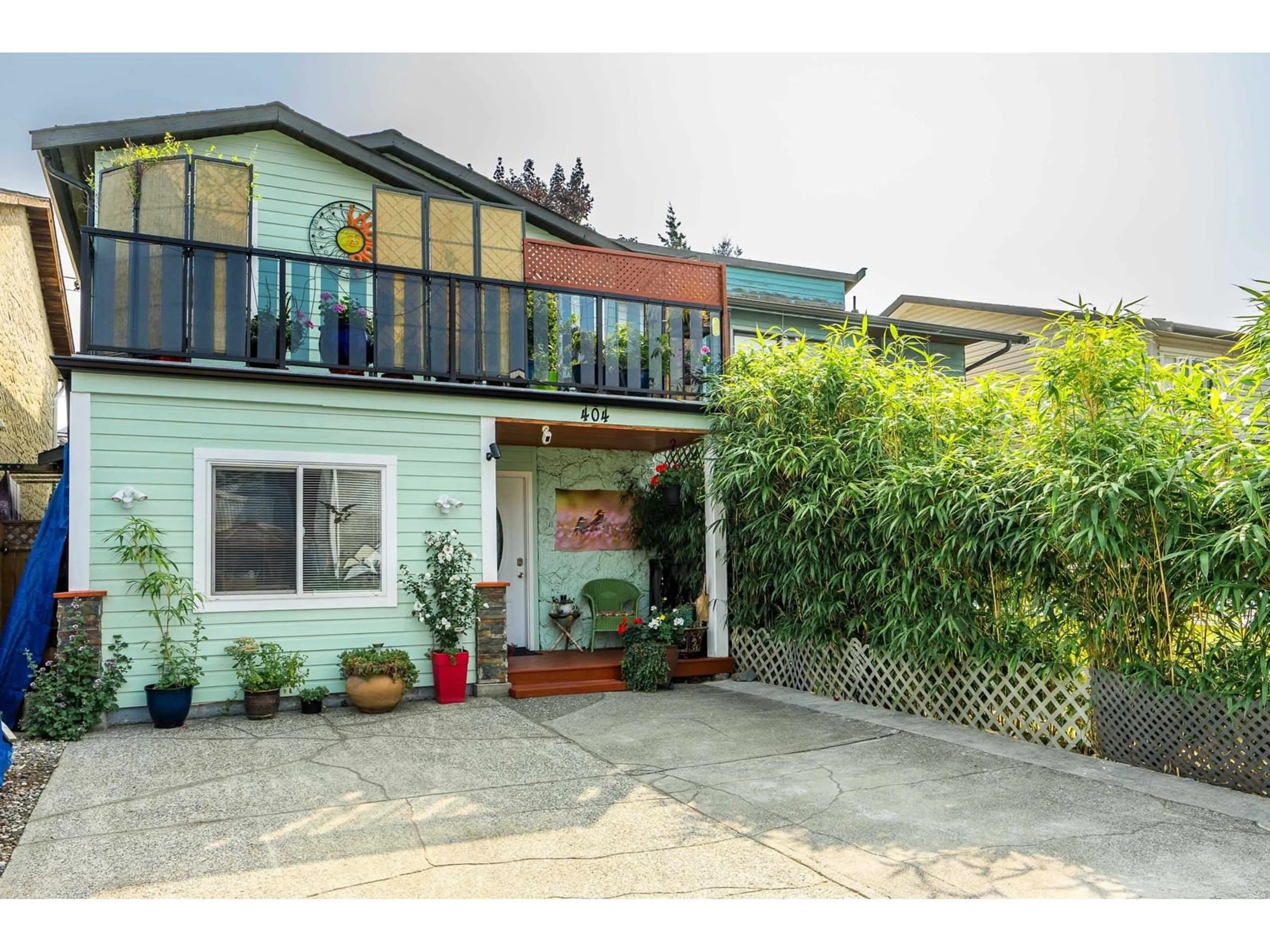 A pic from outside/outdoor area/front of a property/back of a property/a pic from drone, street for 404 BRUNEAU, Langley British Columbia V4W3K9