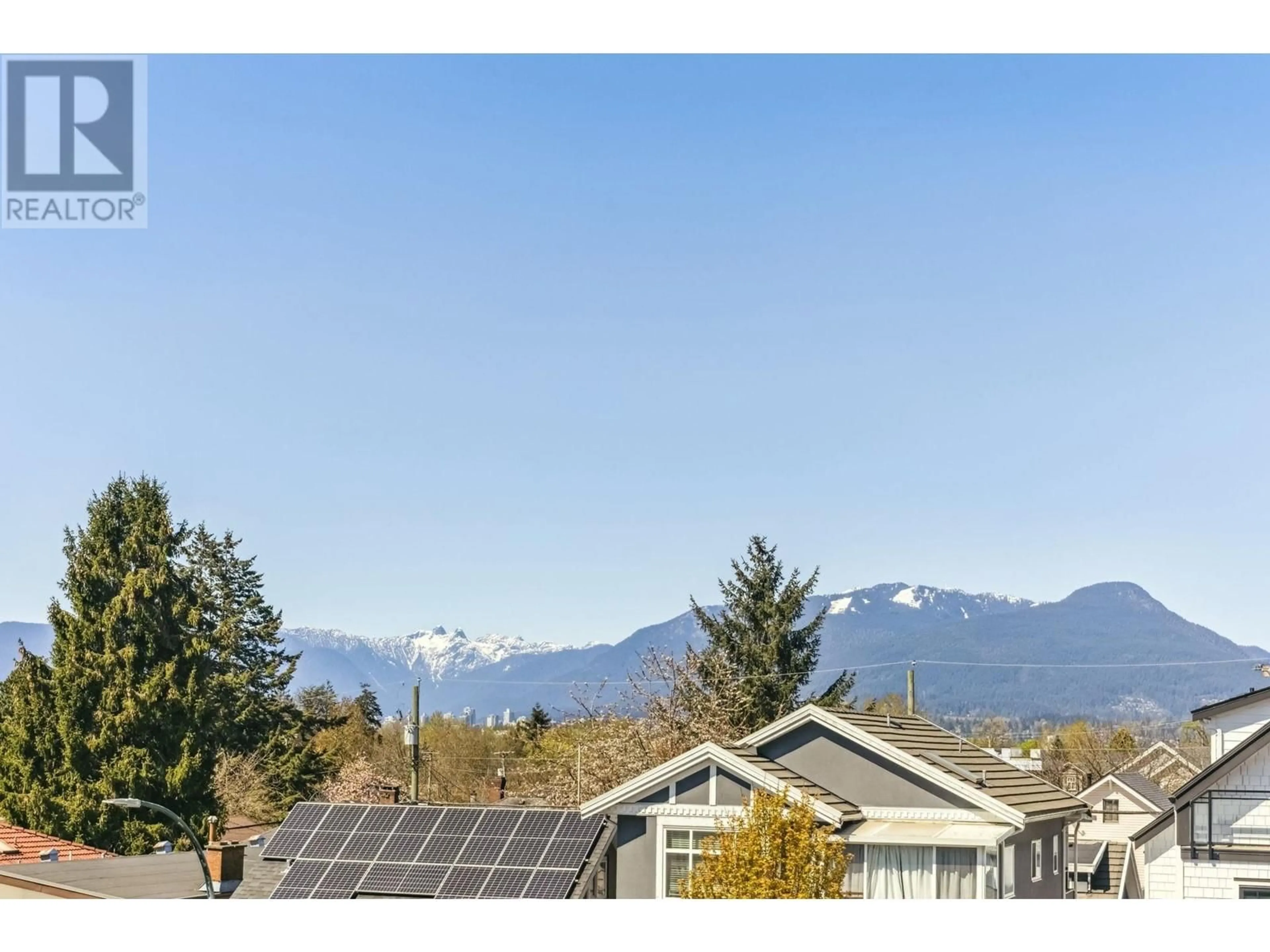 A pic from outside/outdoor area/front of a property/back of a property/a pic from drone, mountain view for 1 - 3148 GEORGIA STREET, Vancouver British Columbia V5K2L1