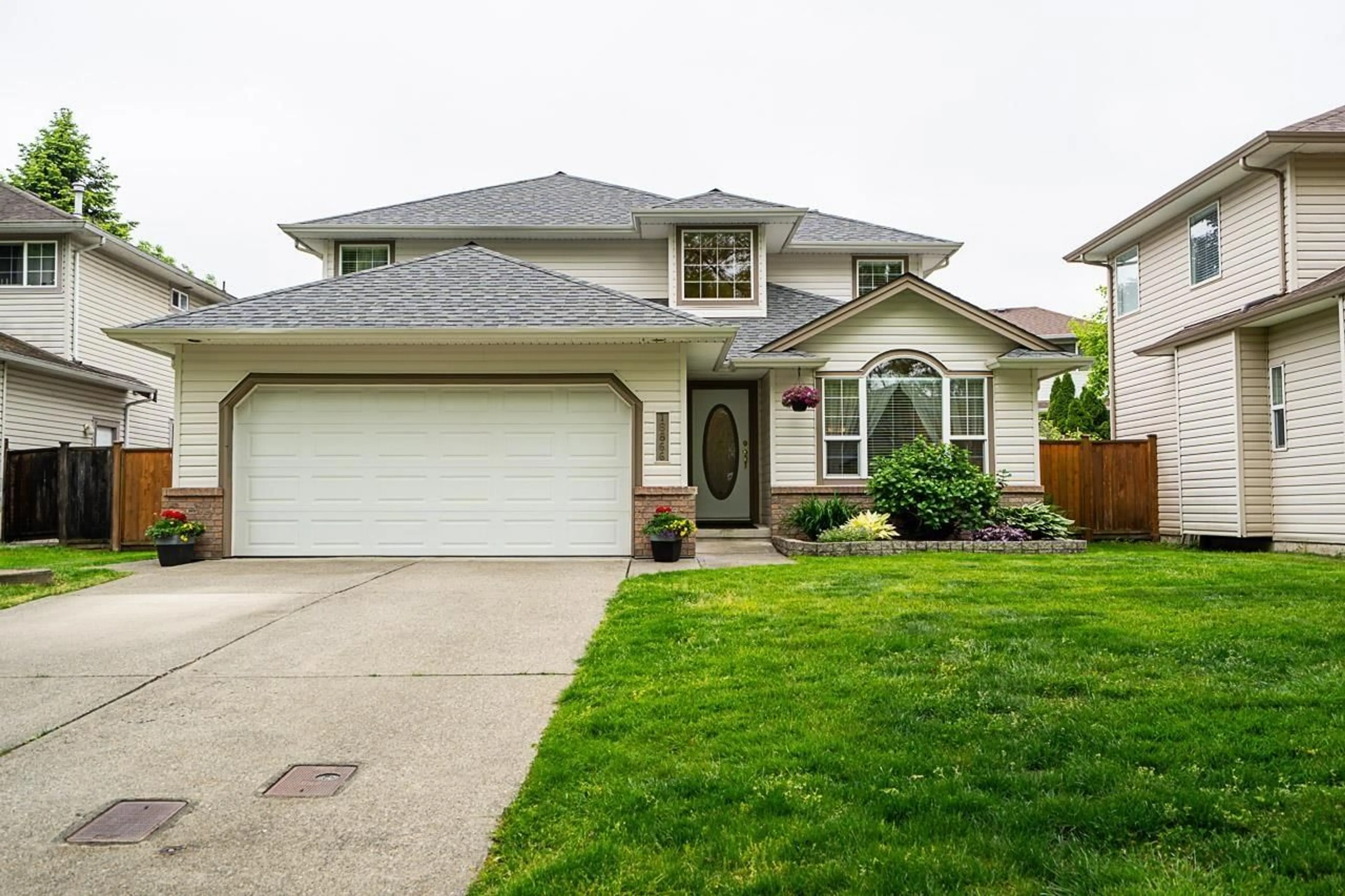 Home with vinyl exterior material, street for 18866 65, Surrey British Columbia V3S8V4