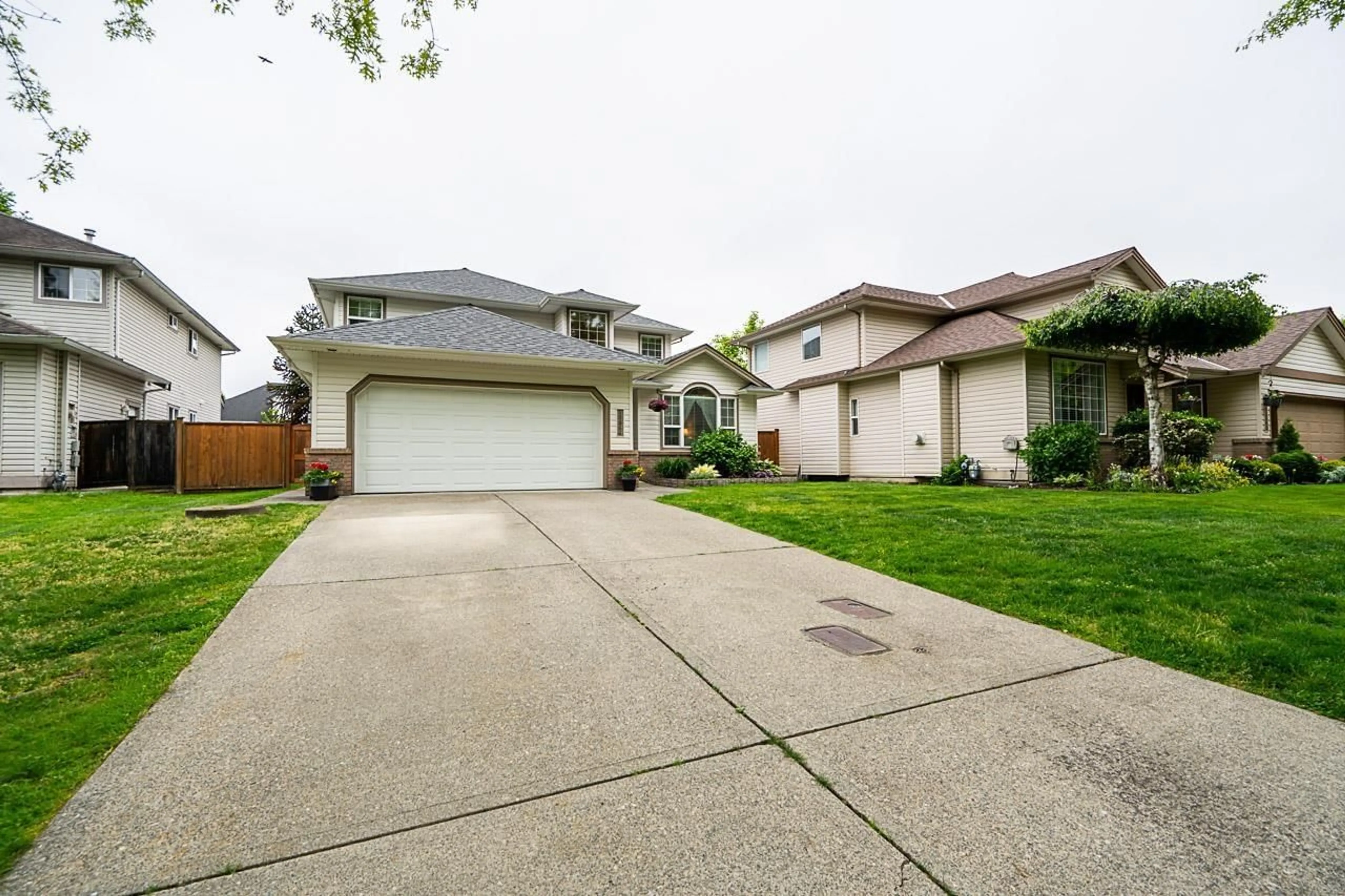A pic from outside/outdoor area/front of a property/back of a property/a pic from drone, street for 18866 65, Surrey British Columbia V3S8V4