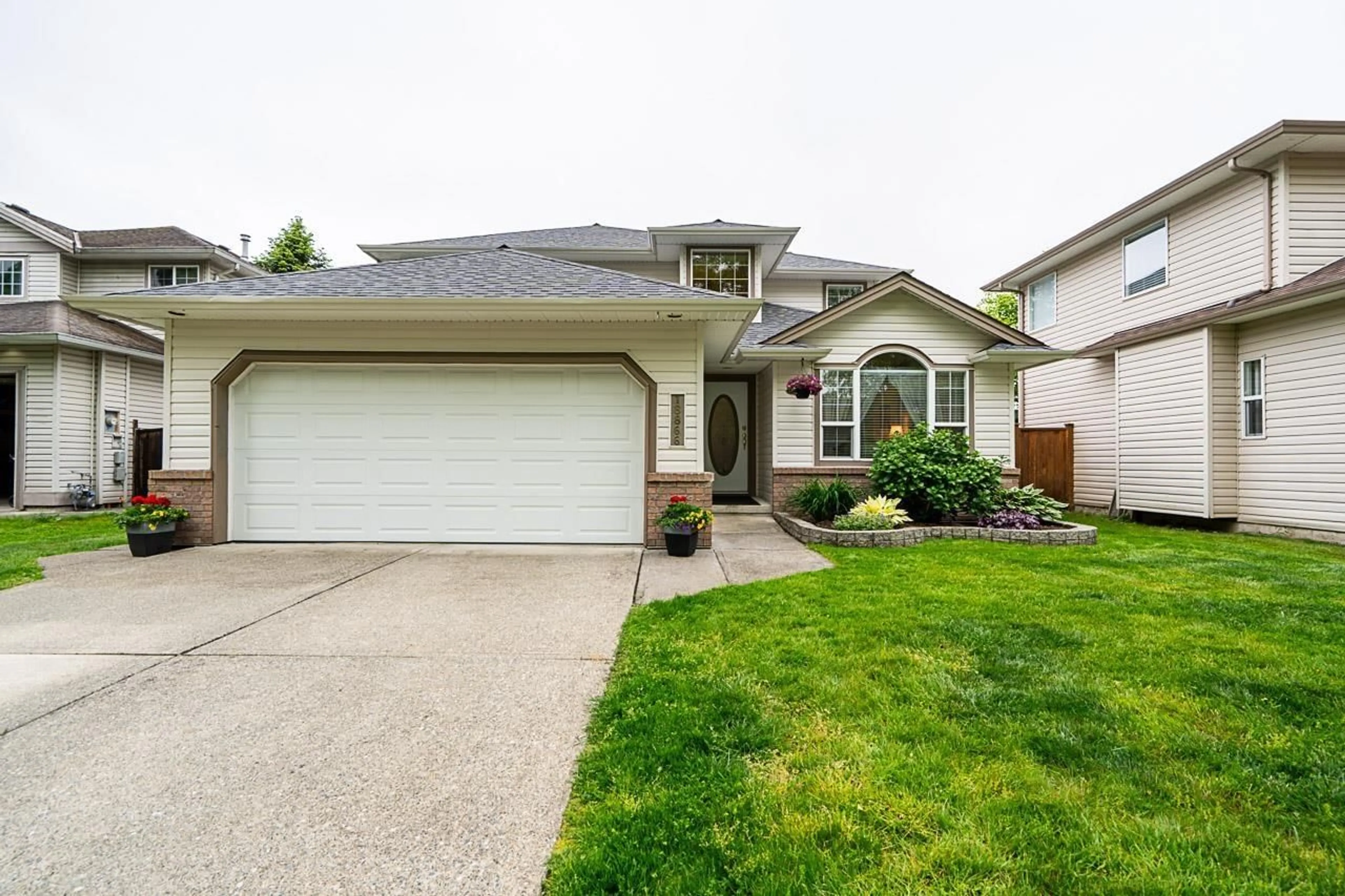 Home with vinyl exterior material, street for 18866 65, Surrey British Columbia V3S8V4