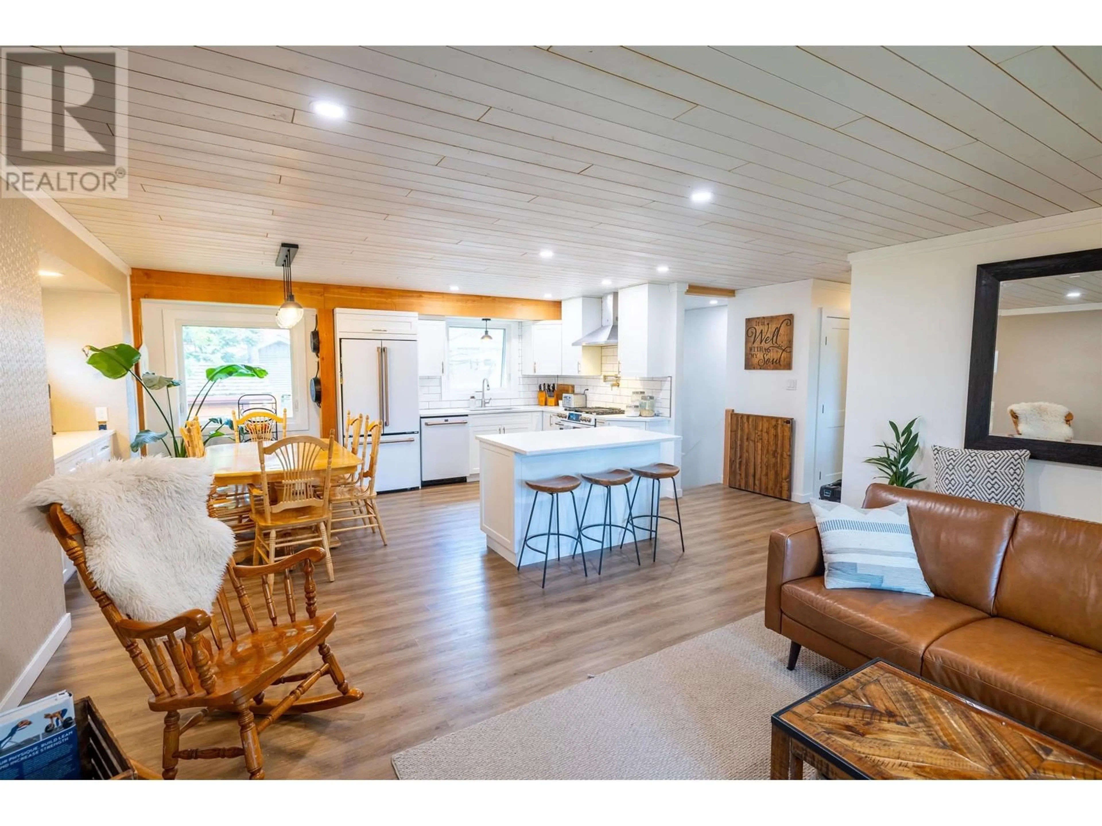 Open concept kitchen, wood/laminate floor for 7720 LANCASTER CRESCENT, Prince George British Columbia V2N3R5