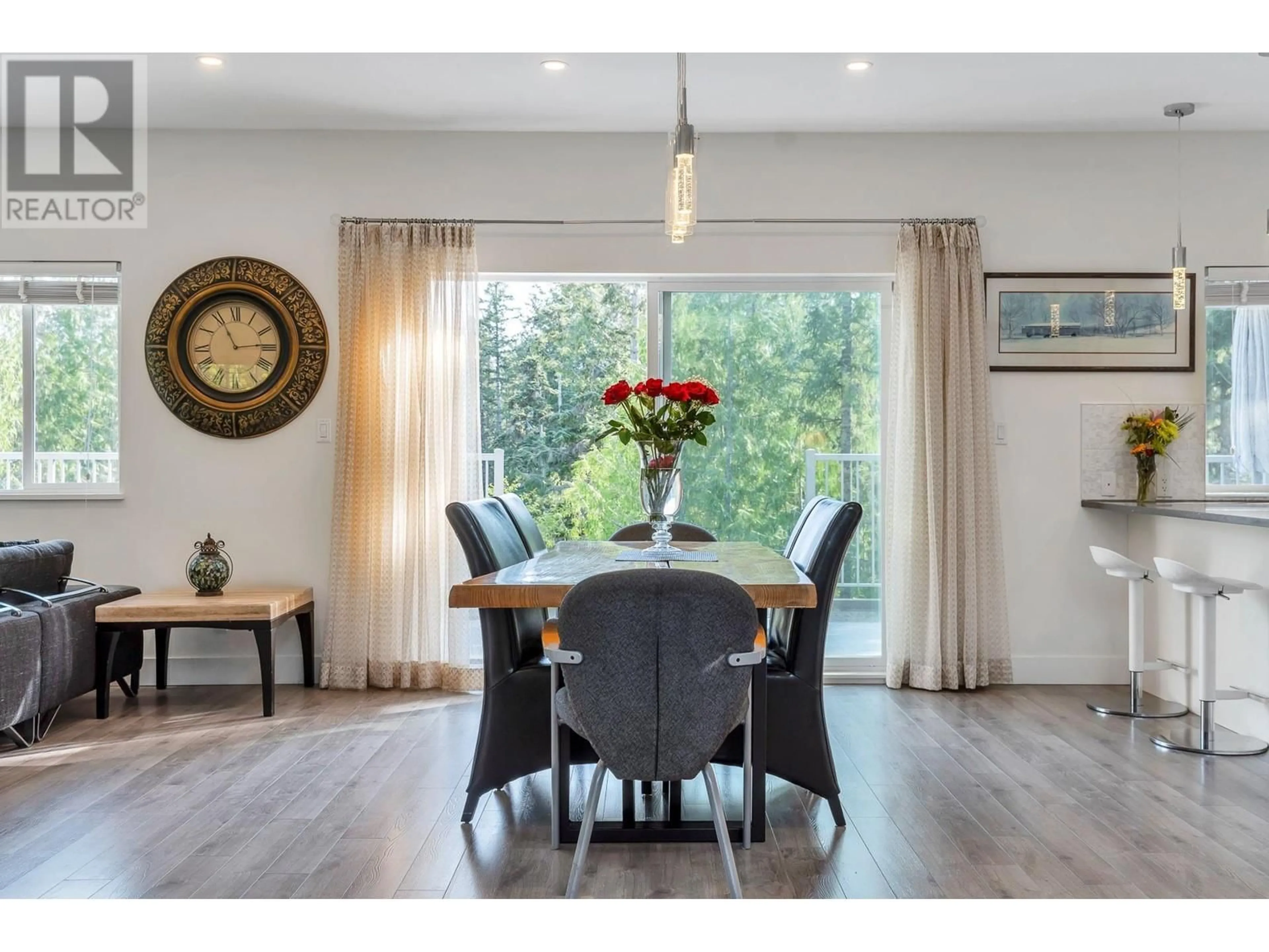 Dining room, wood/laminate floor for 9431 STEPHENS WAY, Halfmoon Bay British Columbia V7Z1G9