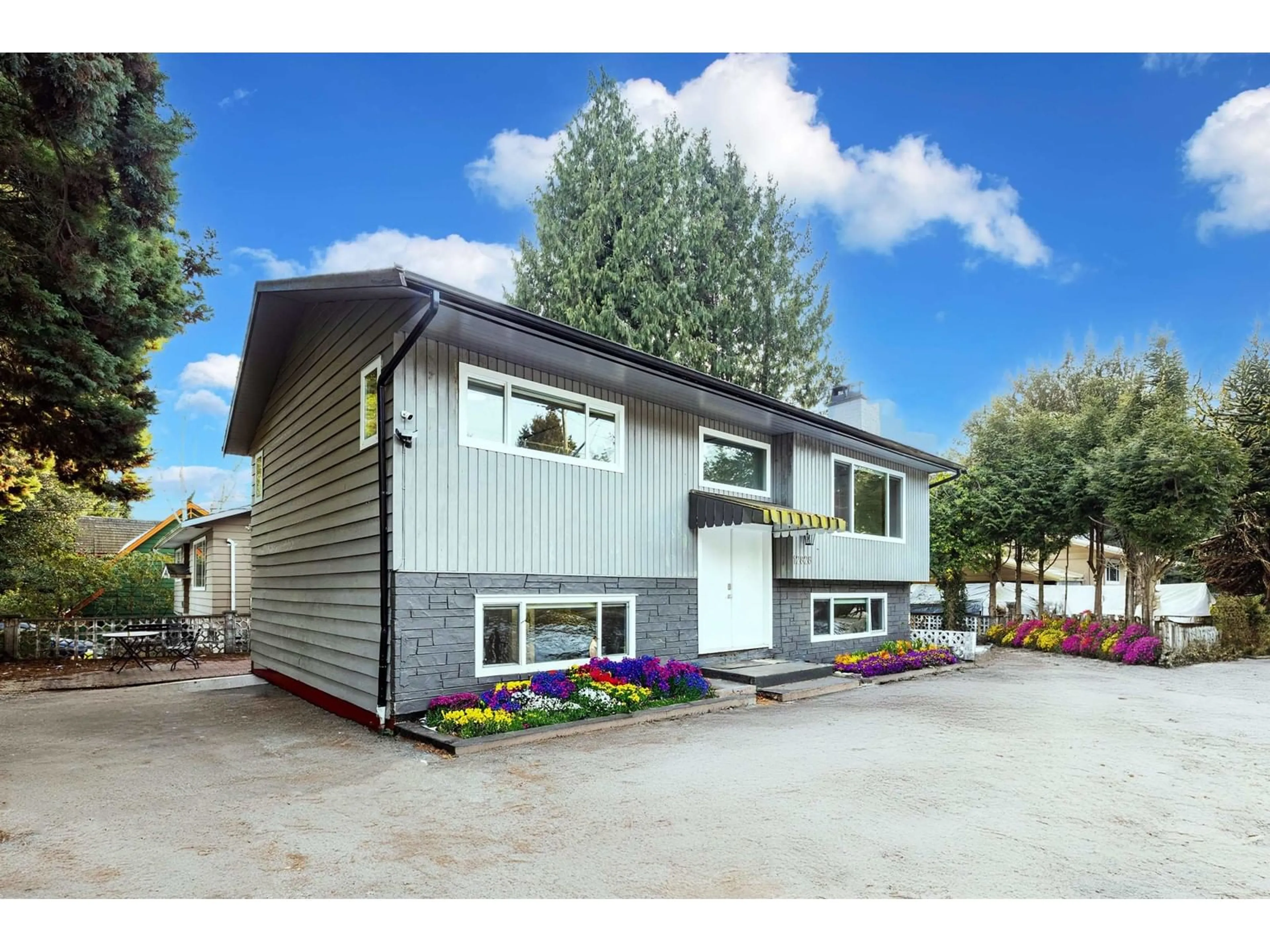 Home with vinyl exterior material, street for 12828 MARINE, Surrey British Columbia V4A1C6