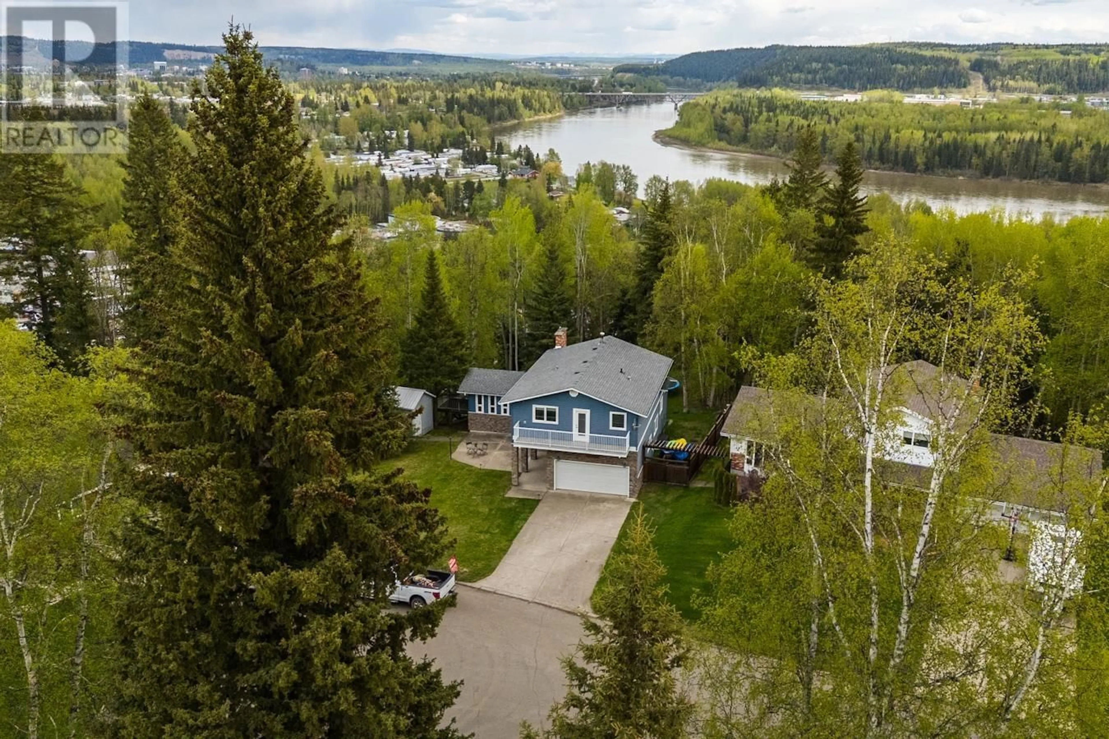 A pic from outside/outdoor area/front of a property/back of a property/a pic from drone, water/lake/river/ocean view for 2502 LAURENTIAN PLACE, Prince George British Columbia V2N1Z3