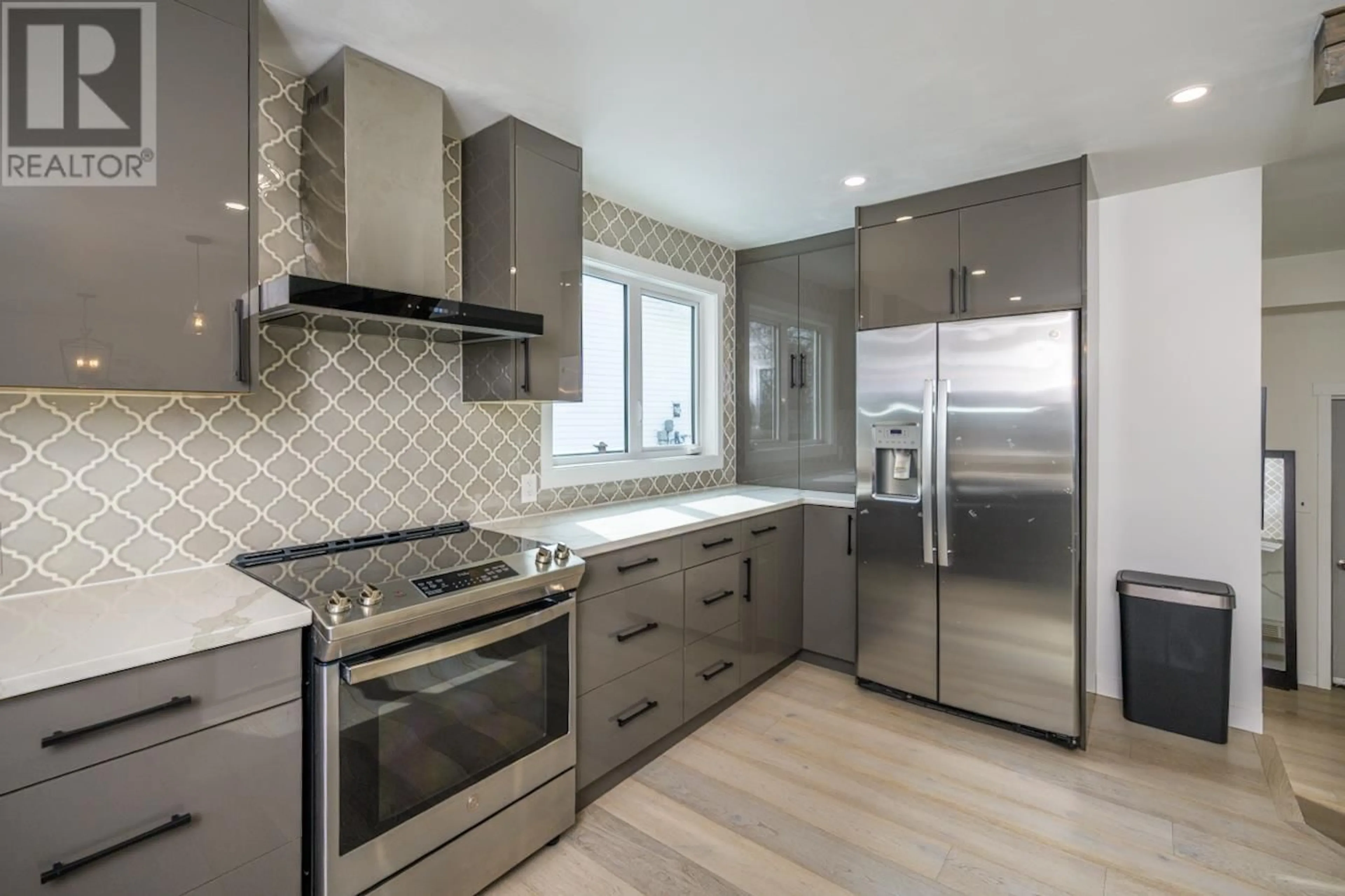 Contemporary kitchen, ceramic/tile floor for 2502 LAURENTIAN PLACE, Prince George British Columbia V2N1Z3
