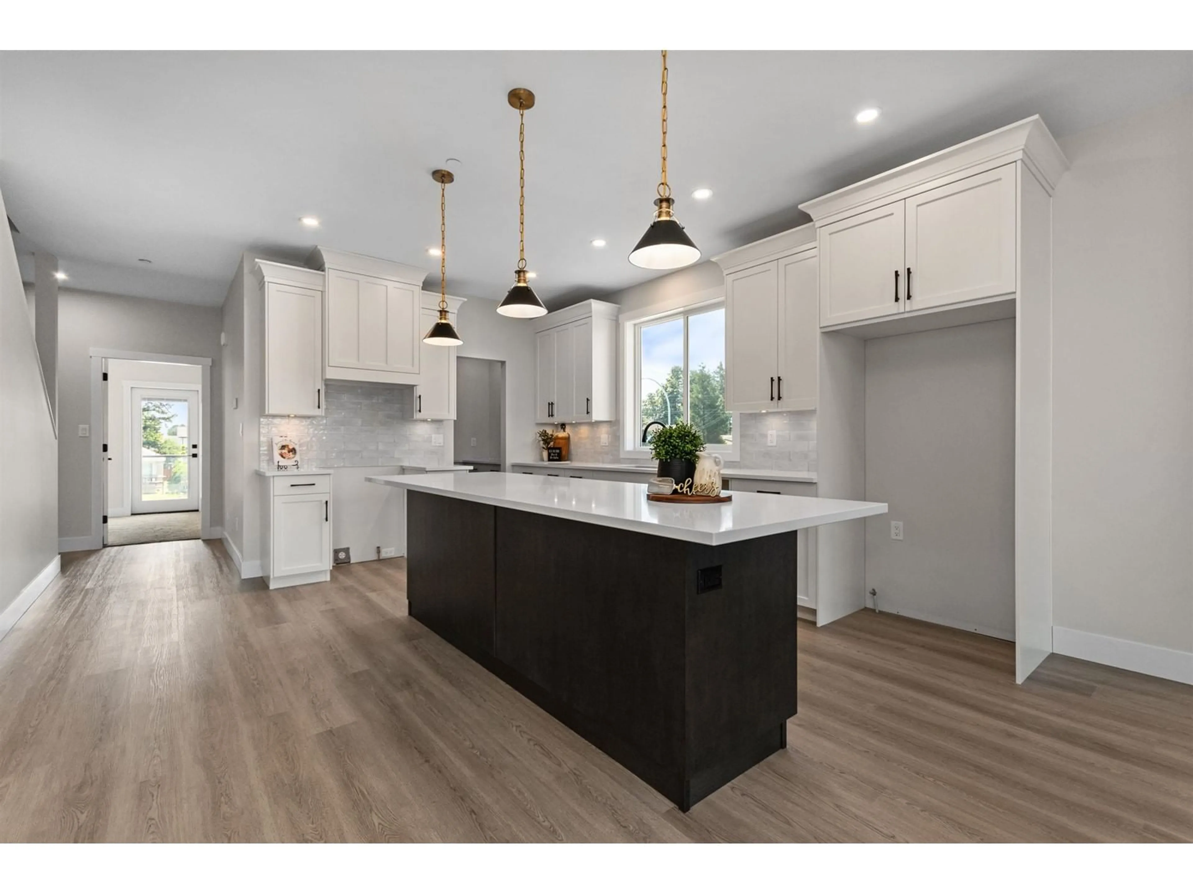 Open concept kitchen, wood/laminate floor for 5951 CARTER ROAD, Chilliwack British Columbia V2R3J8