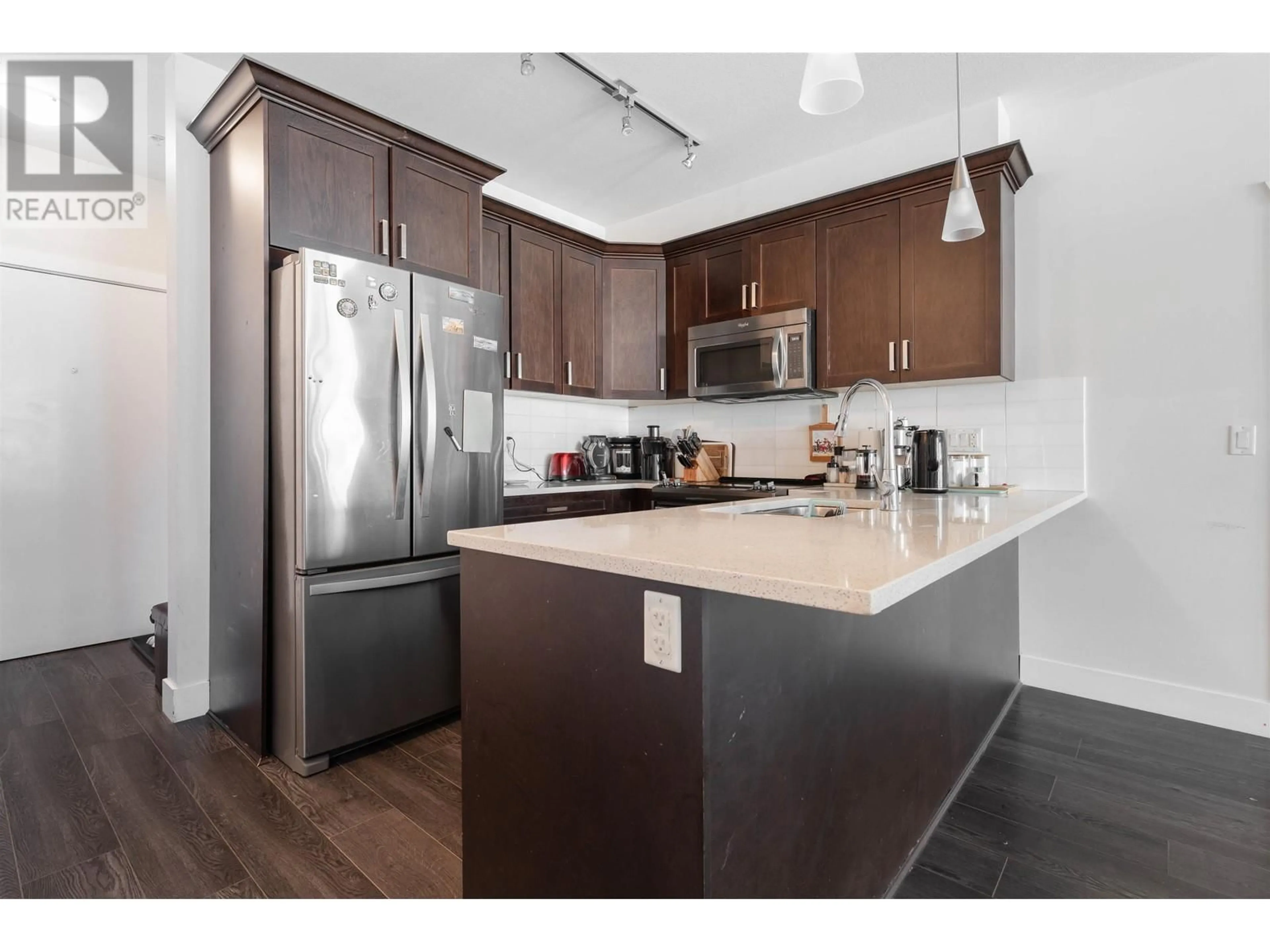 Open concept kitchen, wood/laminate floor for 303 - 2288 WELCHER AVENUE, Port Coquitlam British Columbia V3C1X4