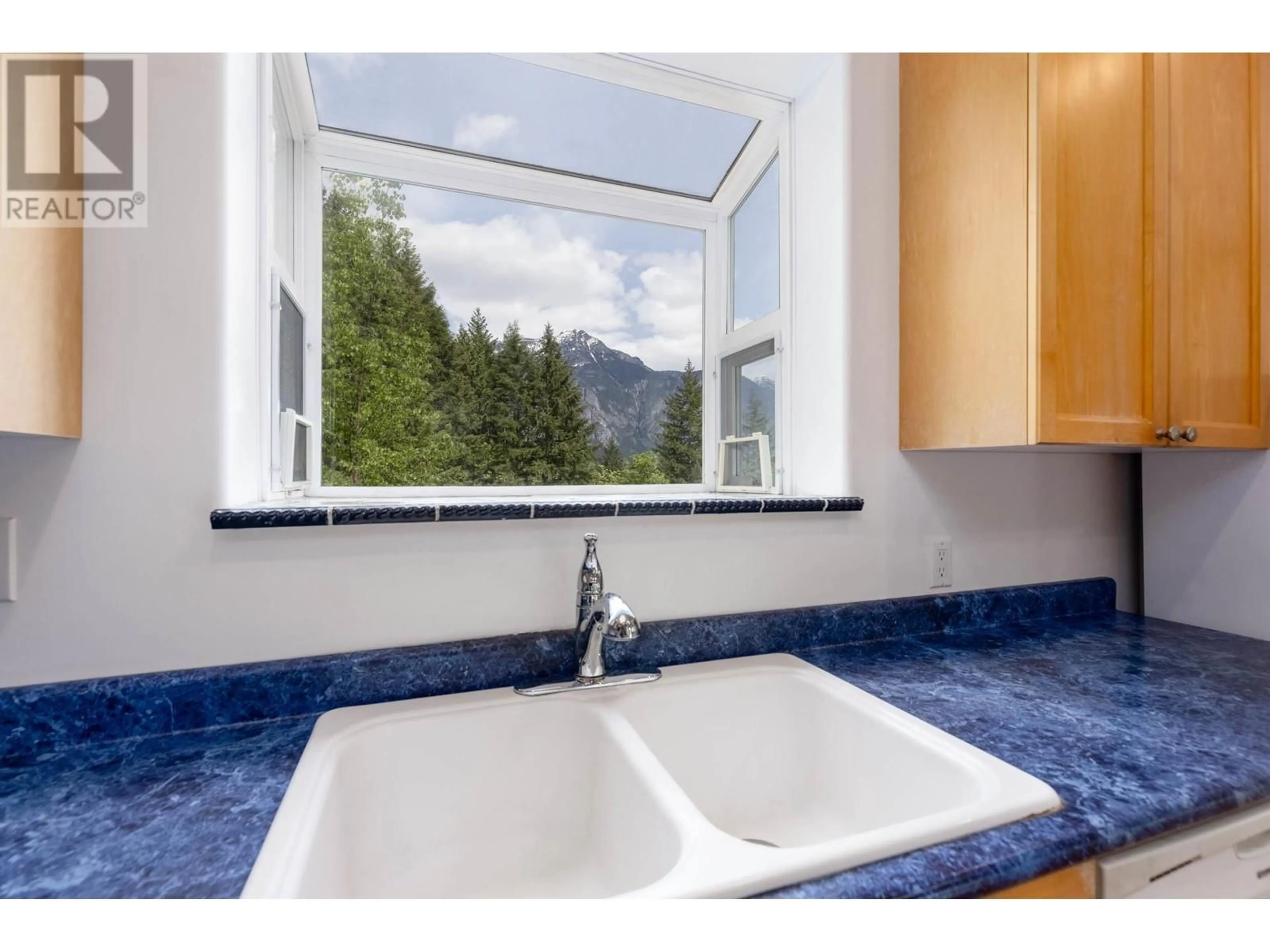 Standard kitchen, ceramic/tile floor for 1737 REID ROAD, Pemberton British Columbia V0N2K0