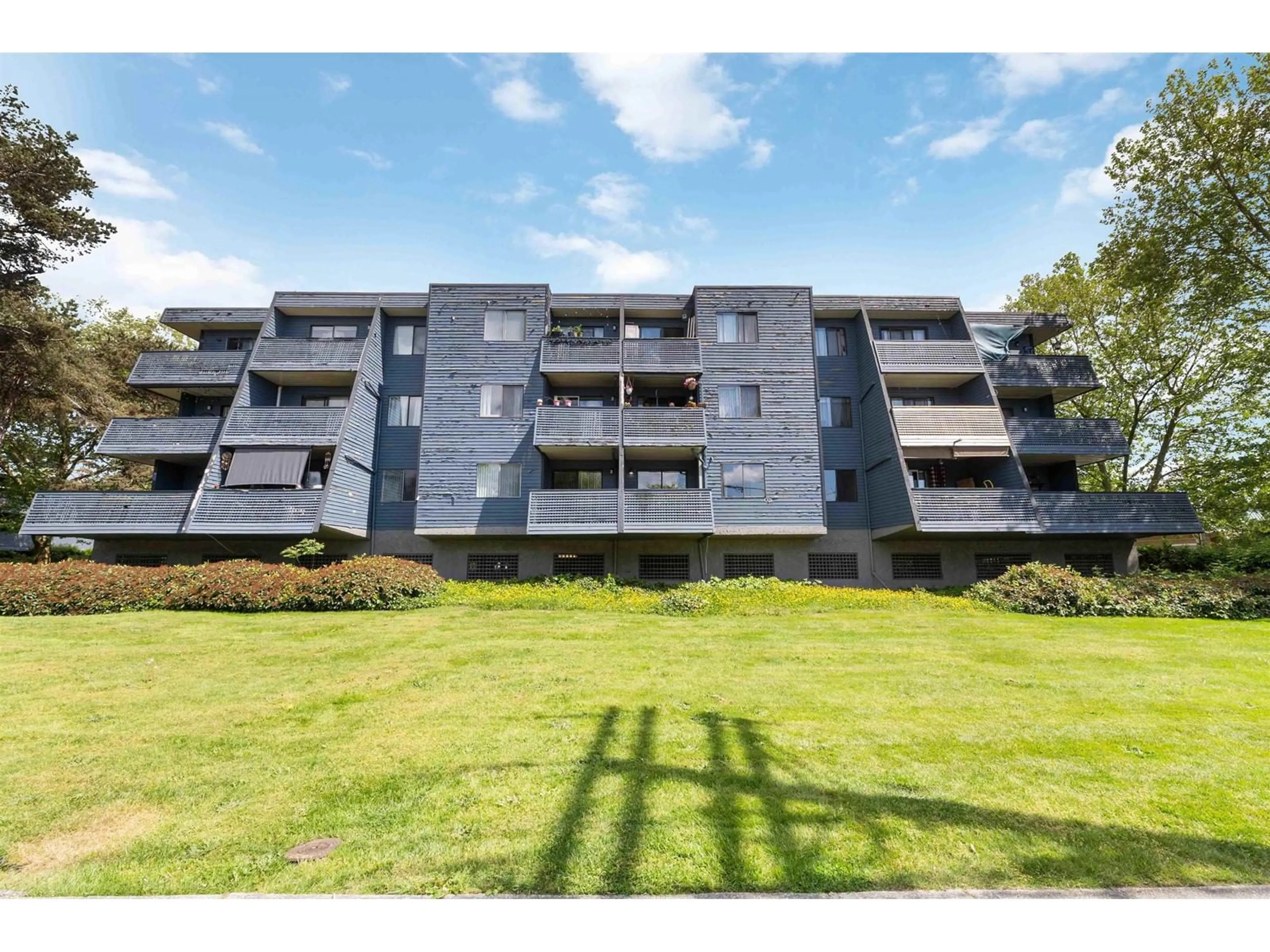 A pic from outside/outdoor area/front of a property/back of a property/a pic from drone, unknown for 104 - 17661 58A, Surrey British Columbia V3S1N4