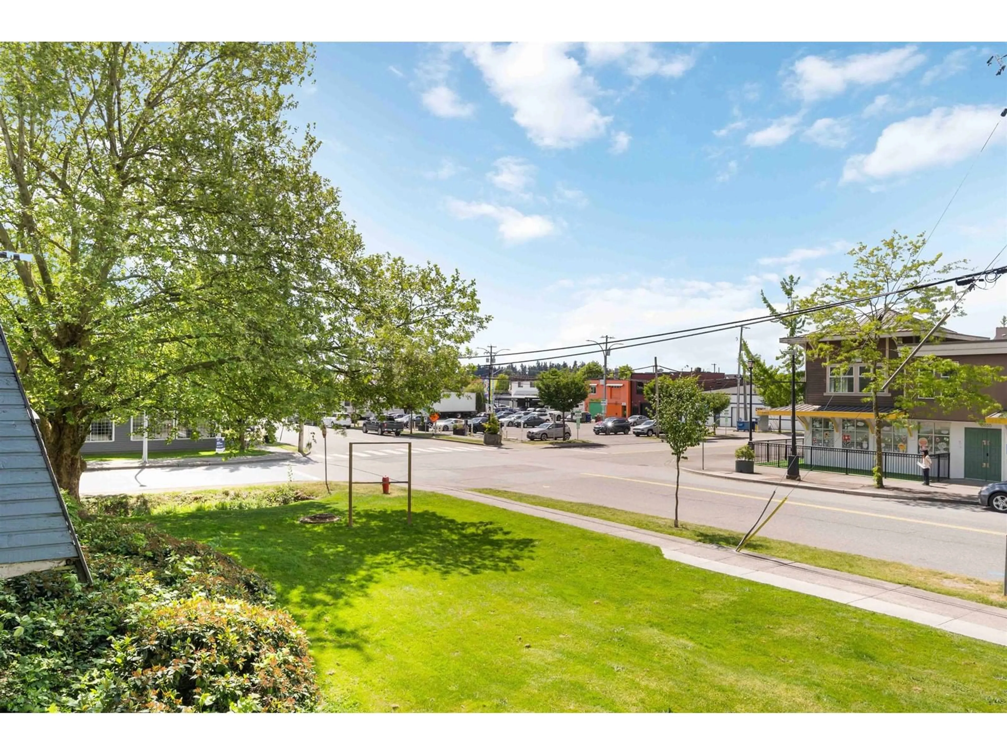 A pic from outside/outdoor area/front of a property/back of a property/a pic from drone, street for 104 - 17661 58A, Surrey British Columbia V3S1N4
