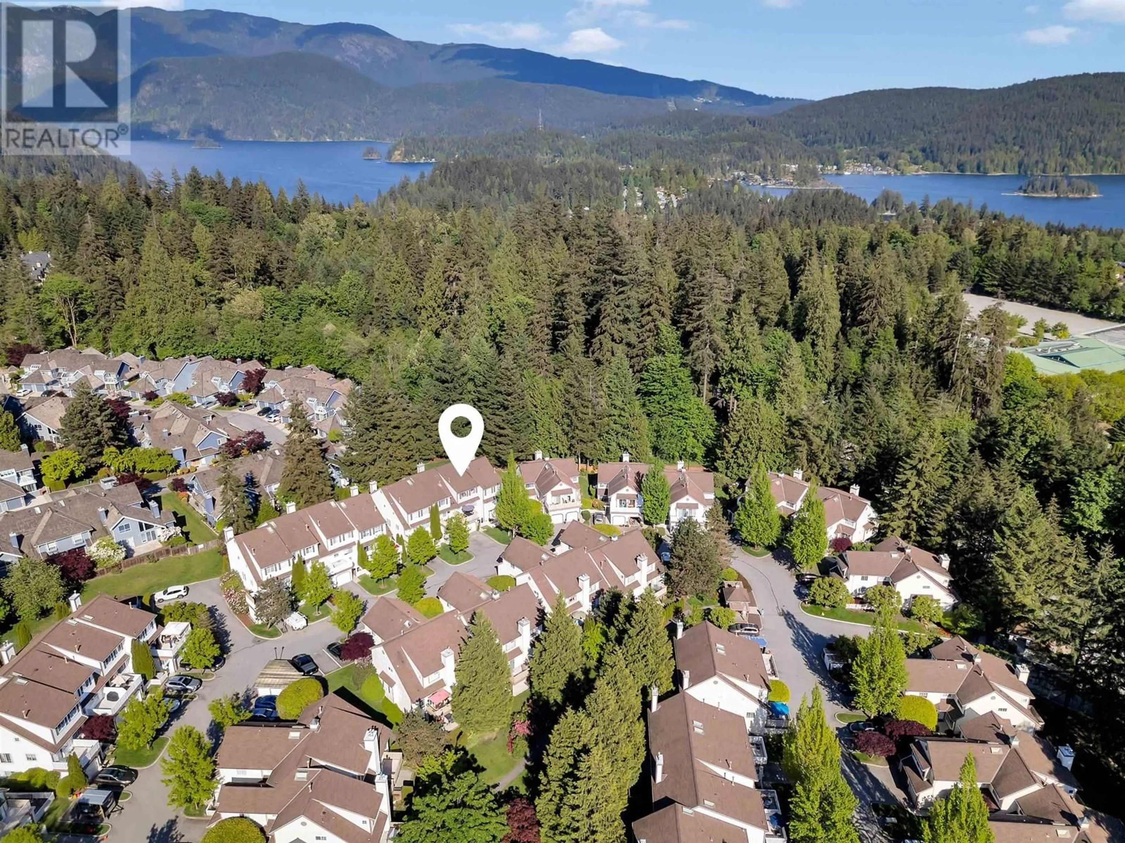 A pic from outside/outdoor area/front of a property/back of a property/a pic from drone, water/lake/river/ocean view for 14 - 3939 INDIAN RIVER DRIVE, North Vancouver British Columbia V7G2P6