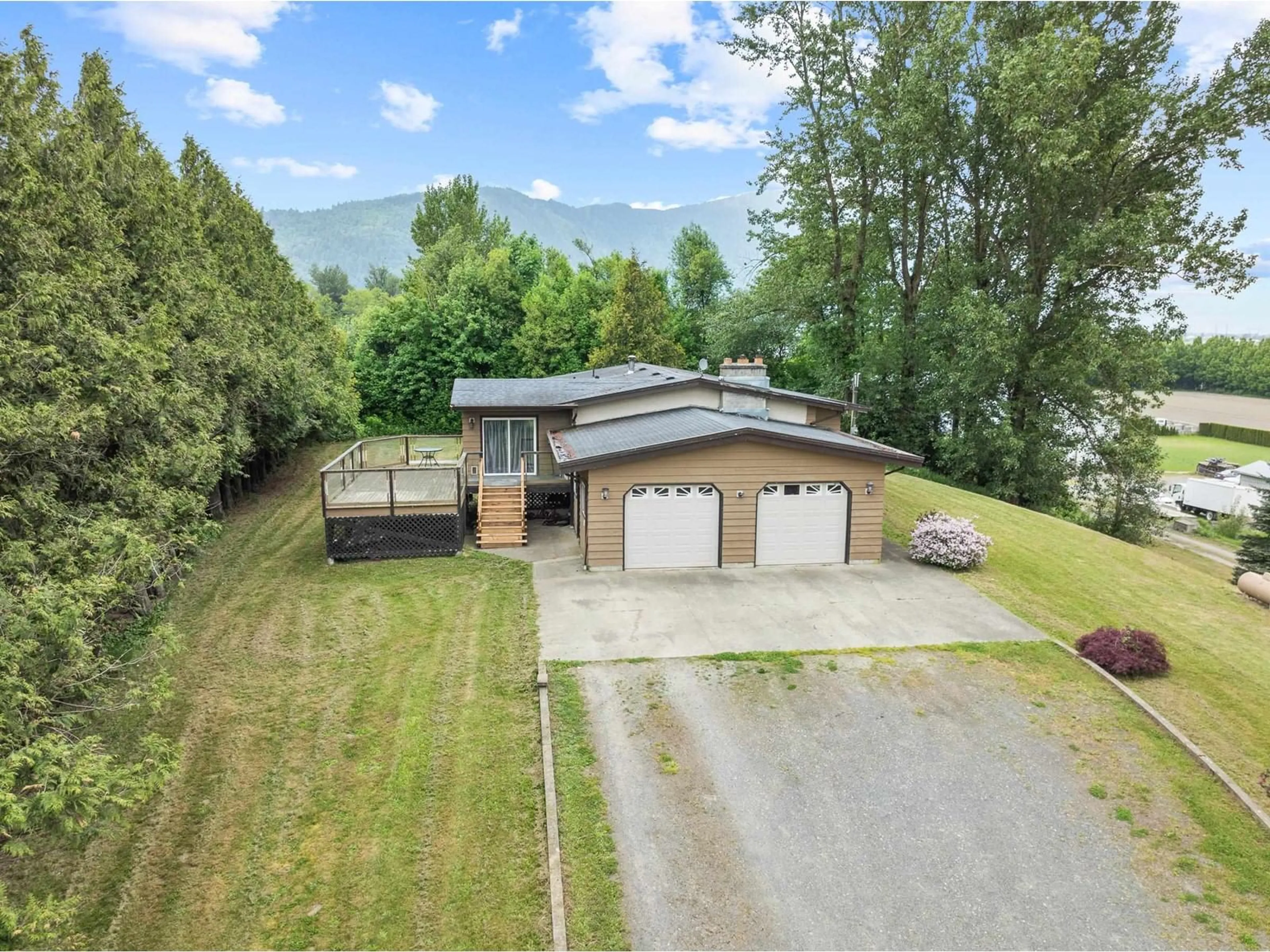 A pic from outside/outdoor area/front of a property/back of a property/a pic from drone, mountain view for 38604 NO 5, Abbotsford British Columbia V3G2G3