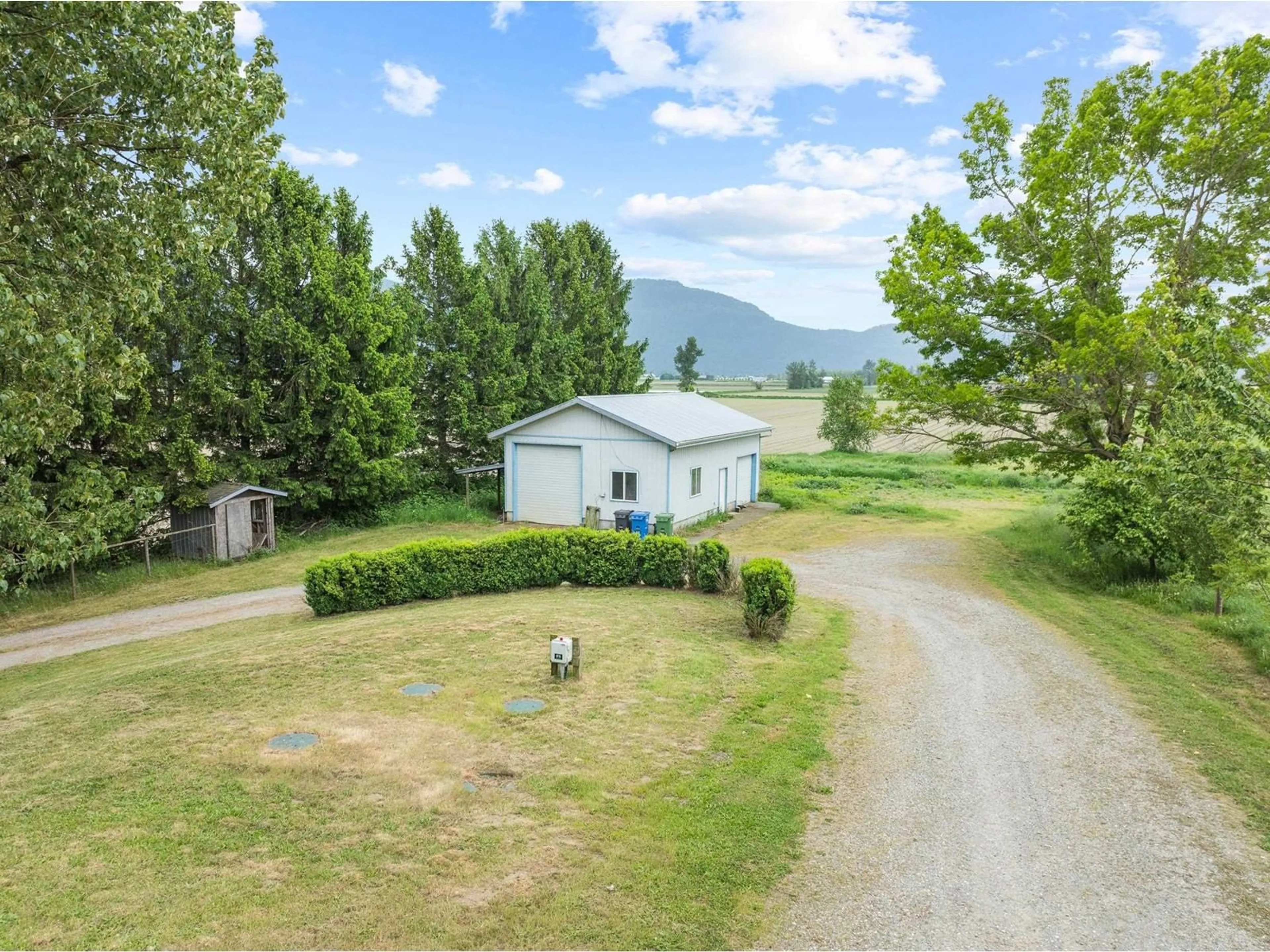 A pic from outside/outdoor area/front of a property/back of a property/a pic from drone, mountain view for 38604 NO 5, Abbotsford British Columbia V3G2G3