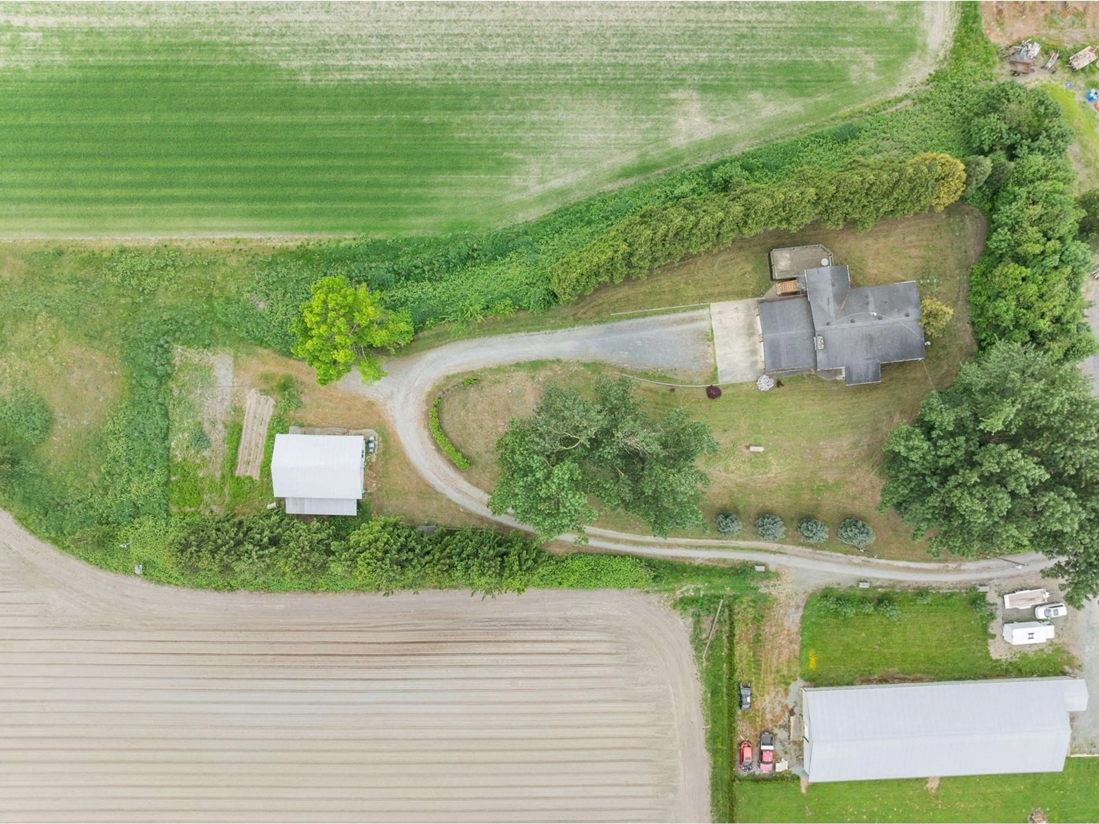 A pic from outside/outdoor area/front of a property/back of a property/a pic from drone, street for 38604 NO 5, Abbotsford British Columbia V3G2G3