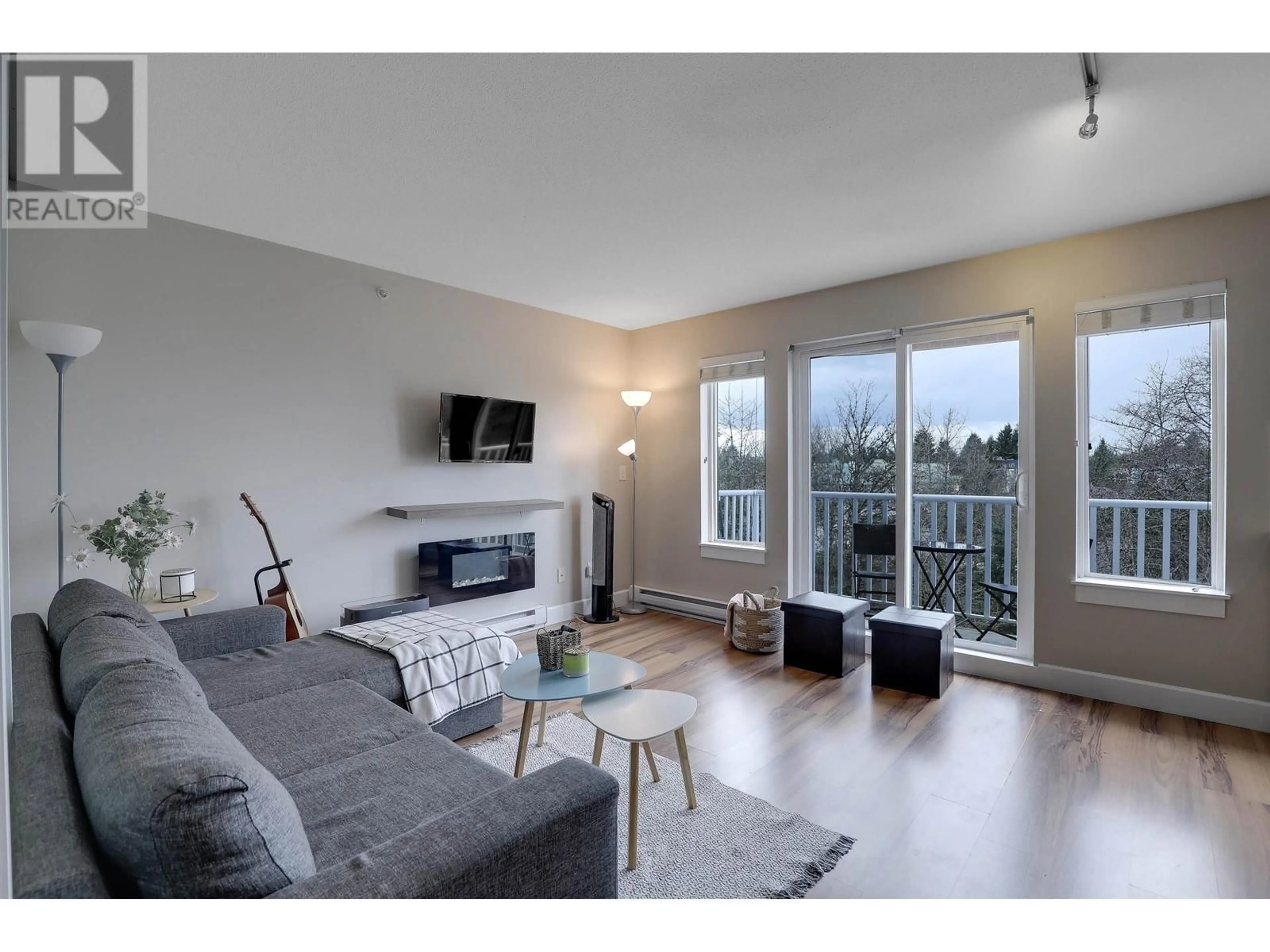 Living room with furniture, wood/laminate floor for 408 - 12283 224TH STREET, Maple Ridge British Columbia V2X8Z3