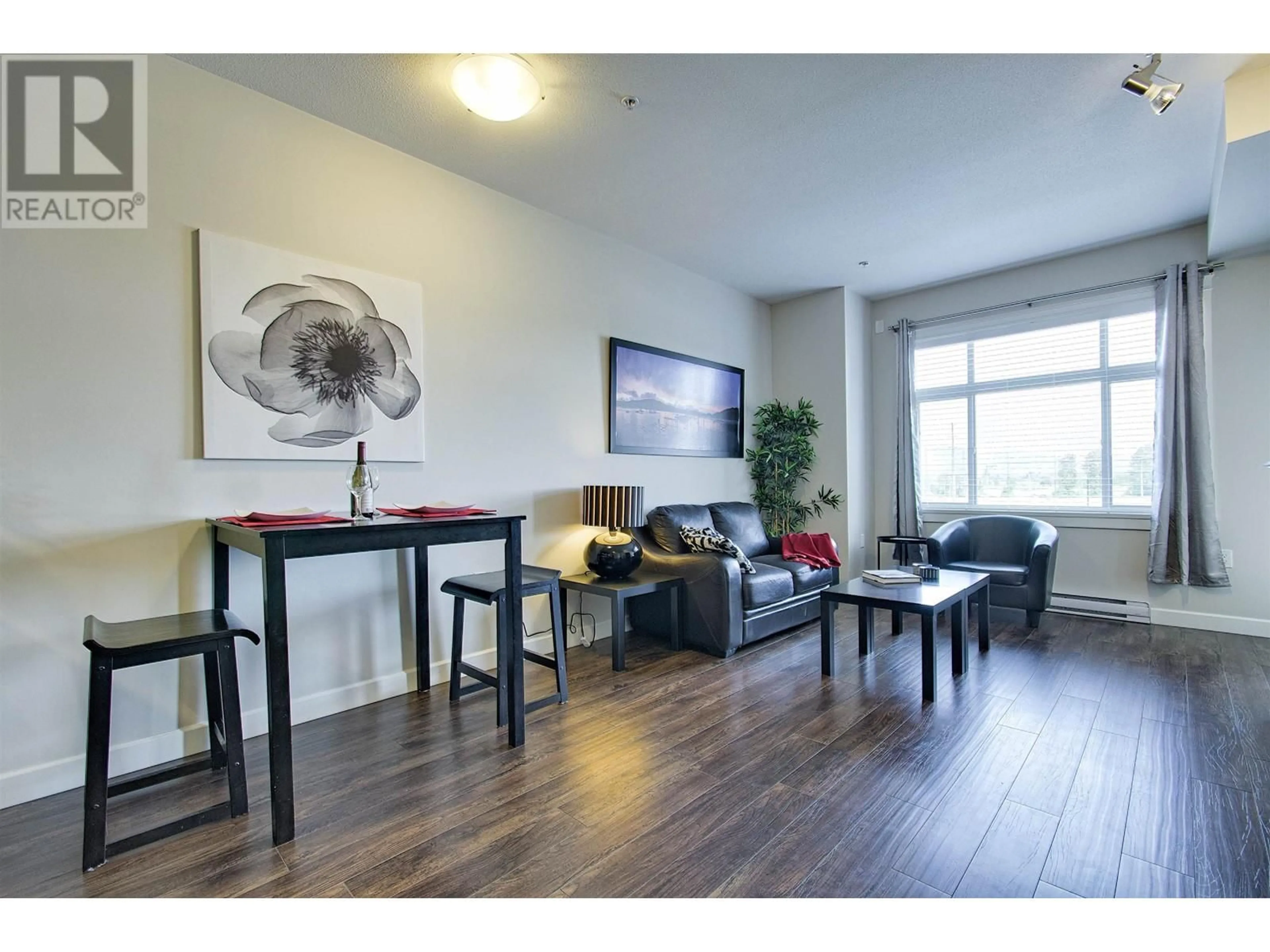 Living room with furniture, wood/laminate floor for 309 - 12655 190A STREET, Pitt Meadows British Columbia V3Y0E9