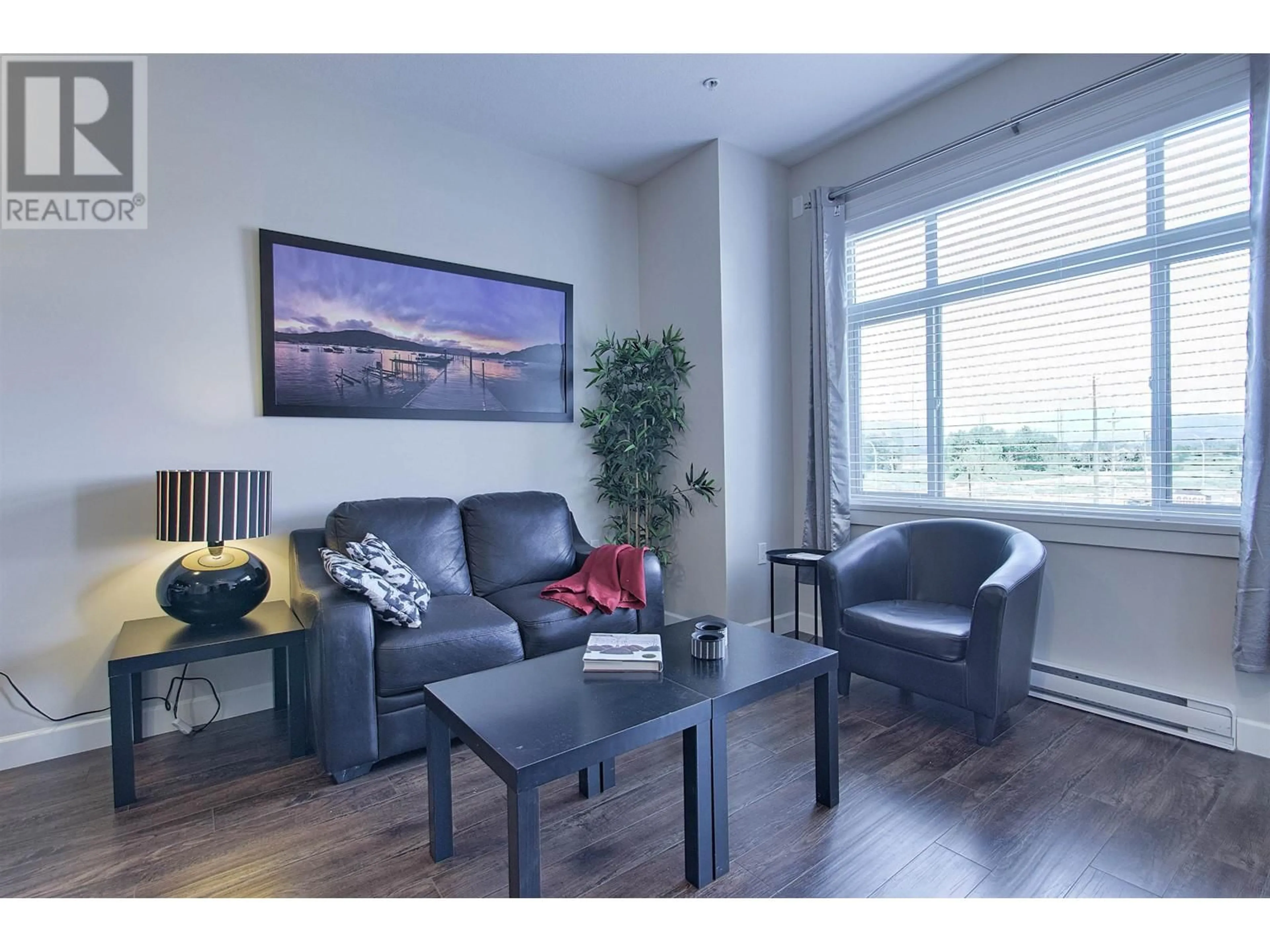 Living room with furniture, wood/laminate floor for 309 - 12655 190A STREET, Pitt Meadows British Columbia V3Y0E9