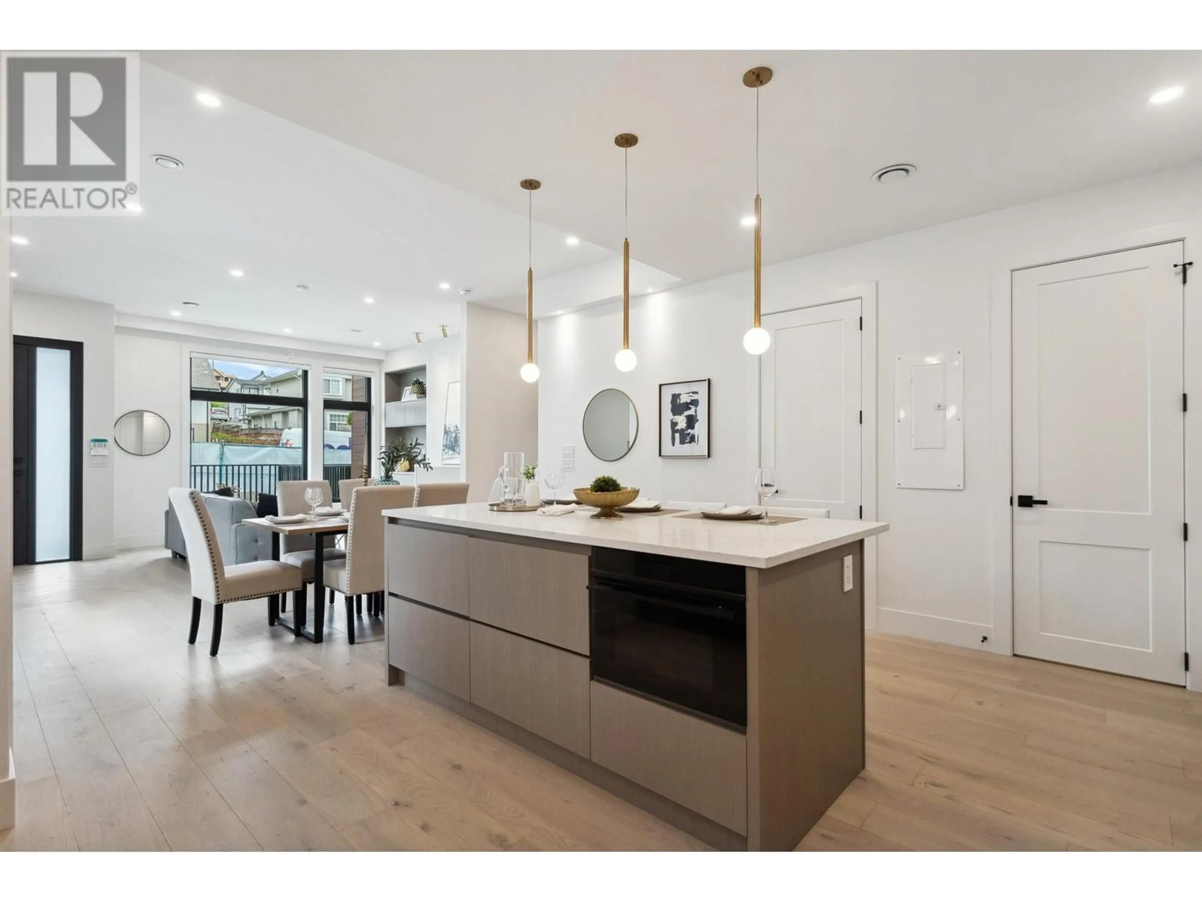 Open concept kitchen, wood/laminate floor for 101 - 1038 DELESTRE AVENUE, Coquitlam British Columbia V3K2H2