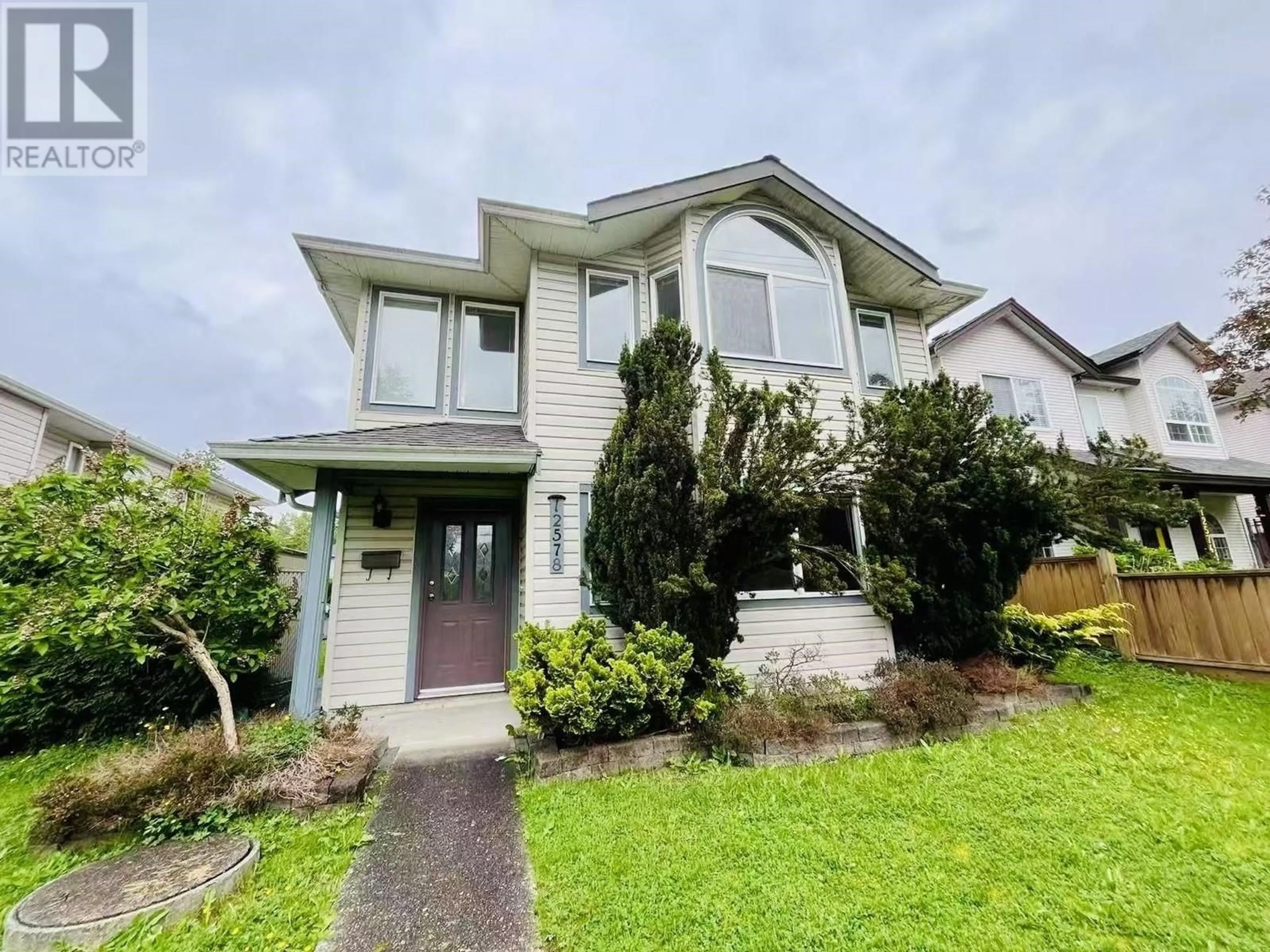 Home with vinyl exterior material, street for 12578 224 STREET, Maple Ridge British Columbia V2X6C1