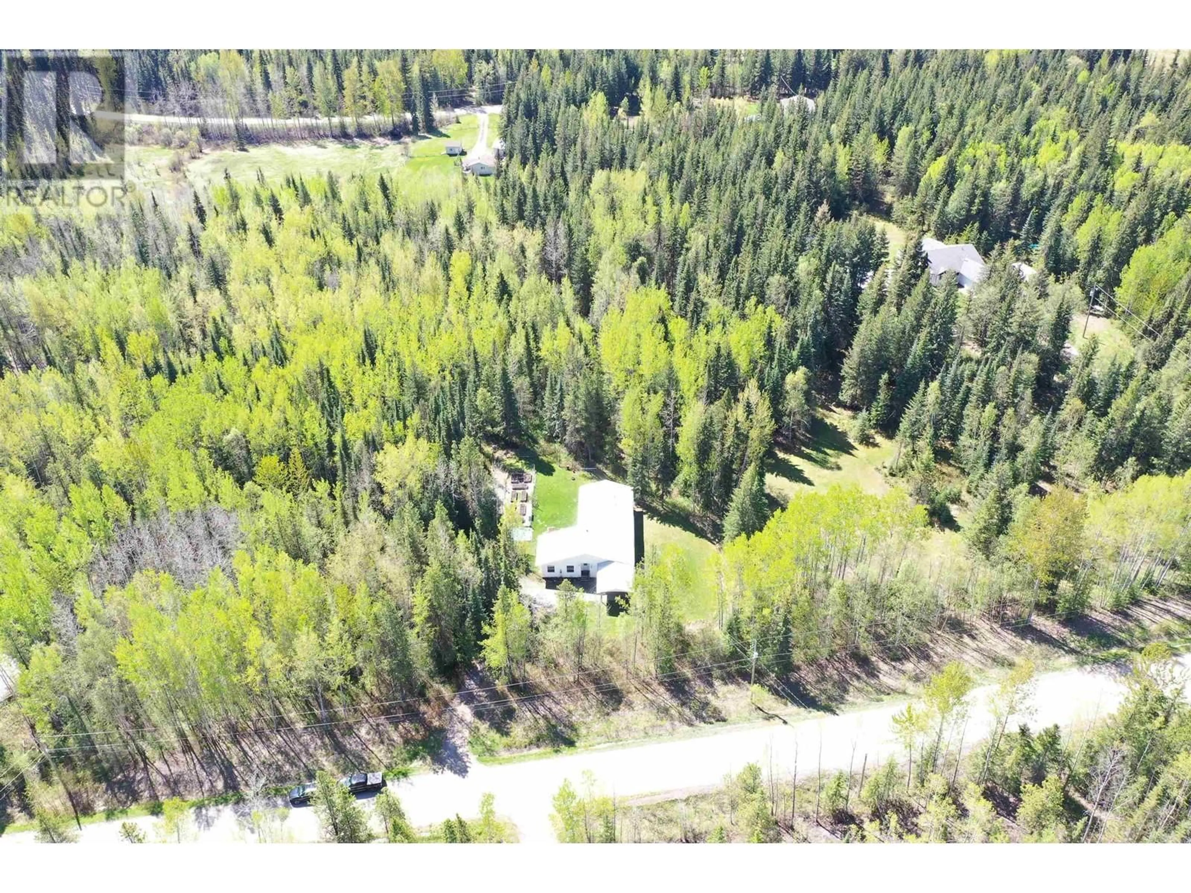 A pic from outside/outdoor area/front of a property/back of a property/a pic from drone, forest/trees view for 728 BEST ROAD, Quesnel British Columbia V2J6X2