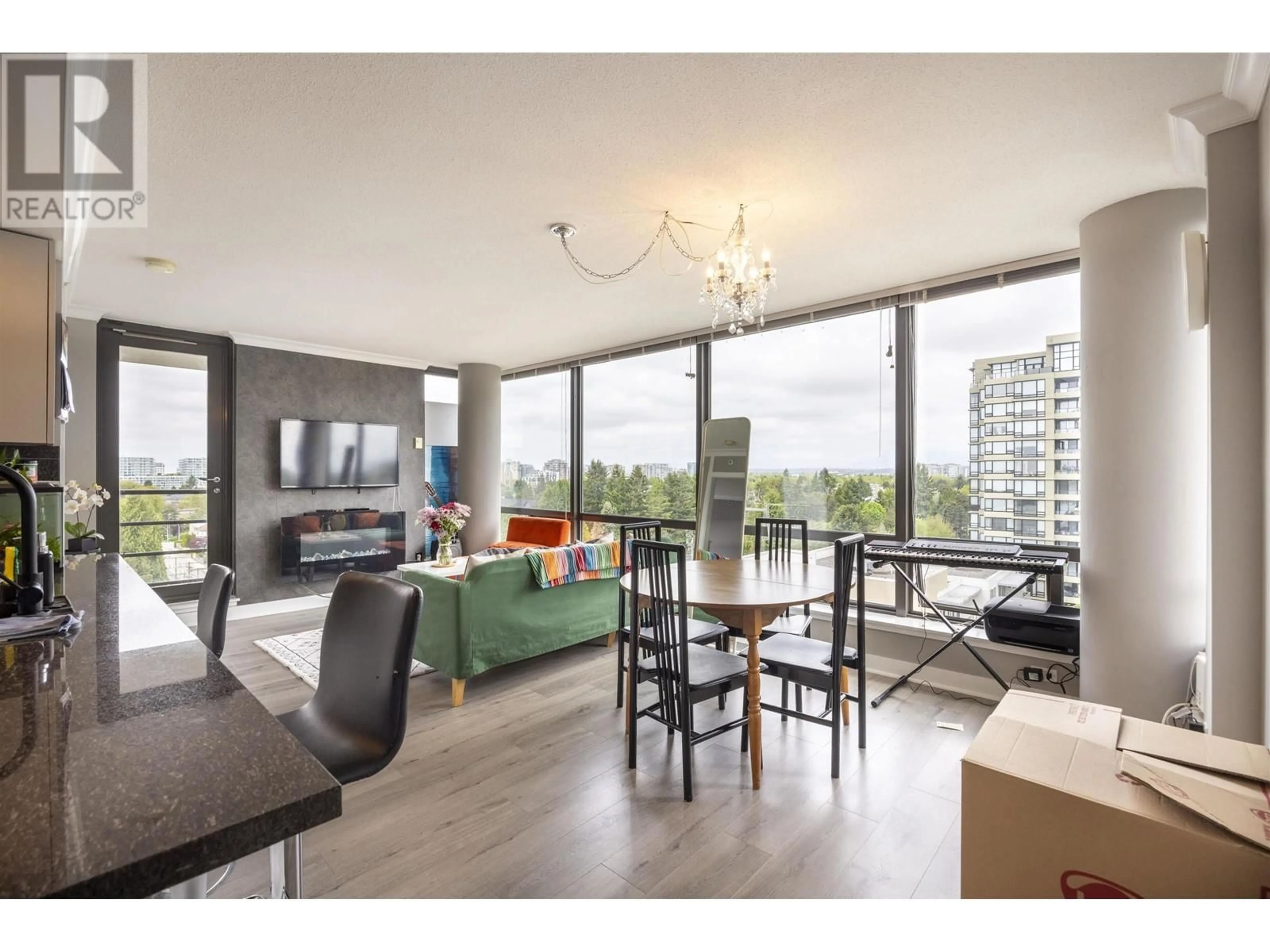 Living room with furniture, wood/laminate floor for 1203 - 9188 COOK ROAD, Richmond British Columbia V6Y4M1