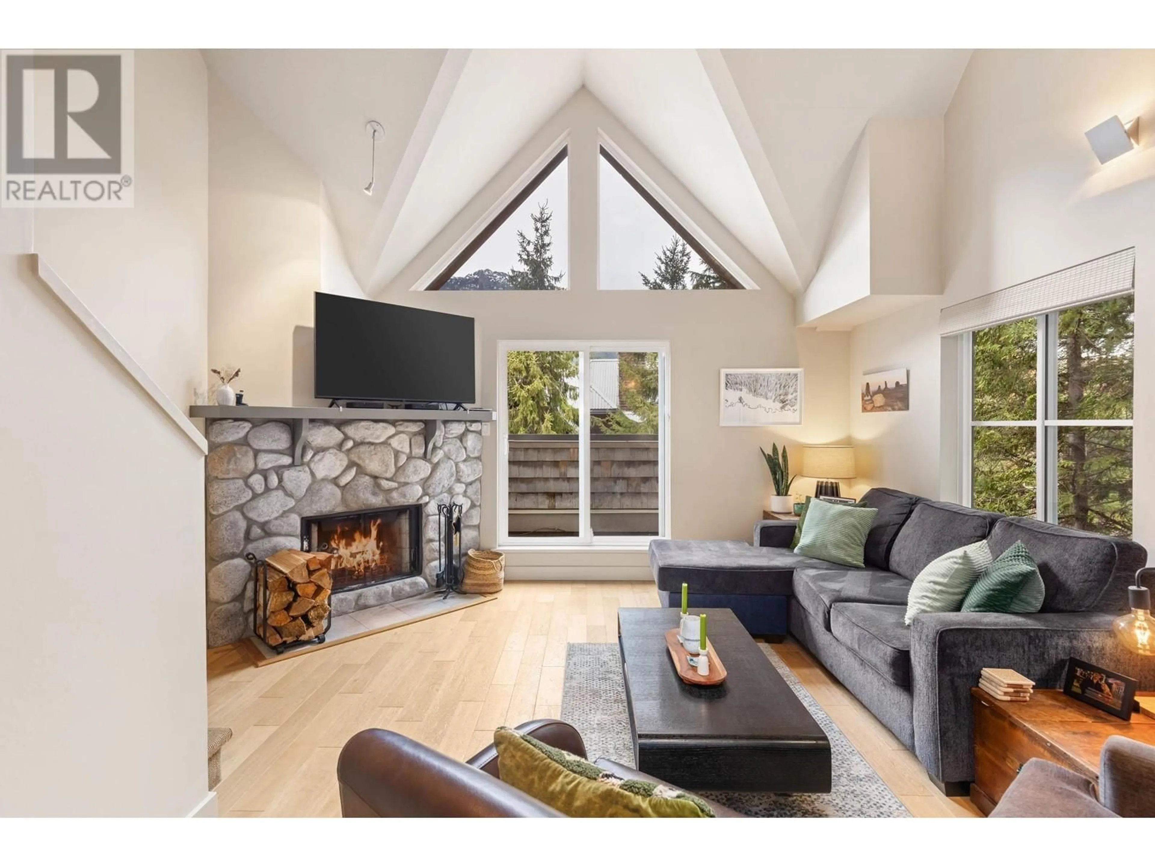 Living room with furniture, unknown for 301 - 2222 CASTLE DRIVE, Whistler British Columbia V8E0L7