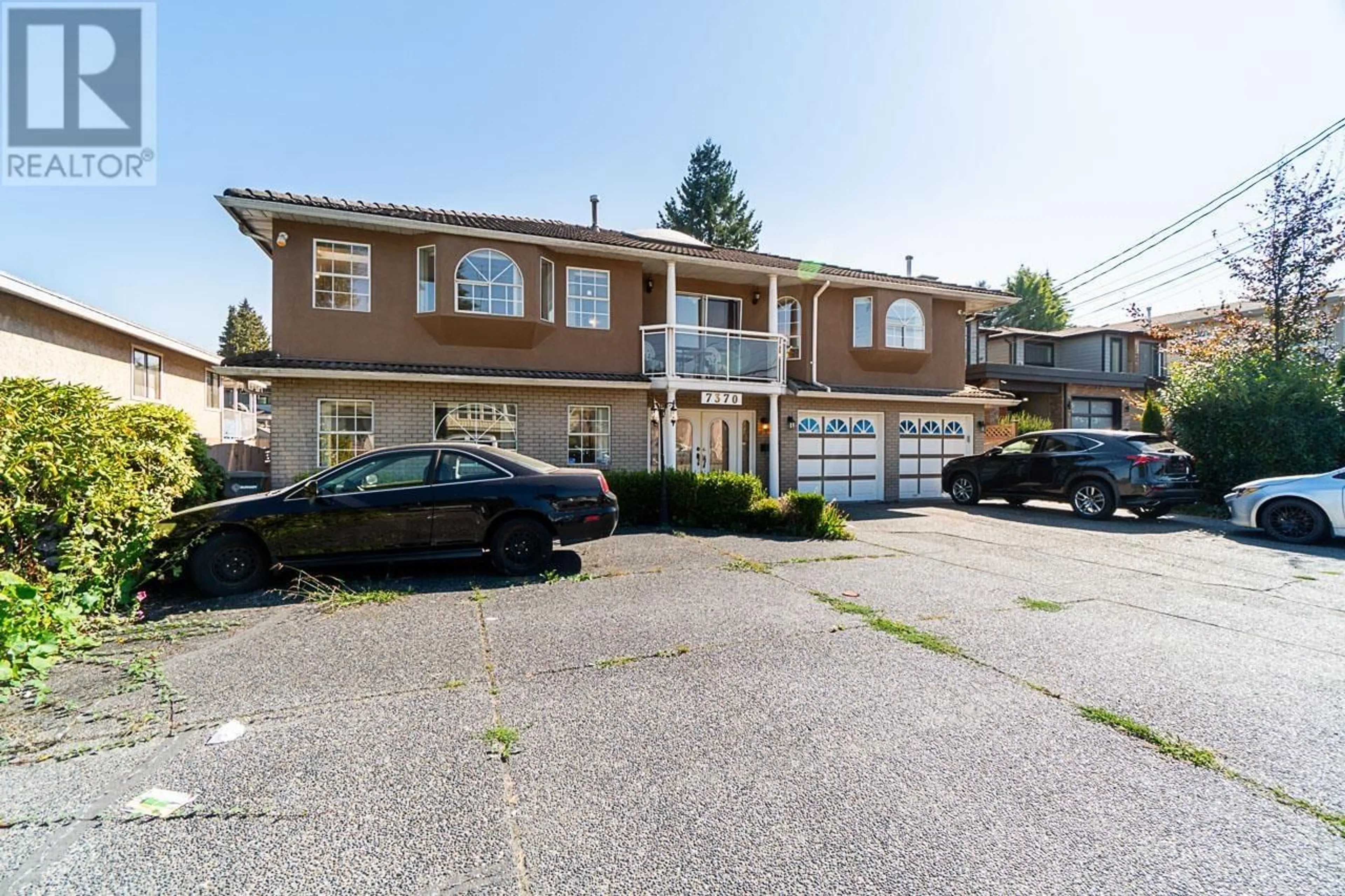 A pic from outside/outdoor area/front of a property/back of a property/a pic from drone, street for 7370 12 AVENUE, Burnaby British Columbia V3N2J9