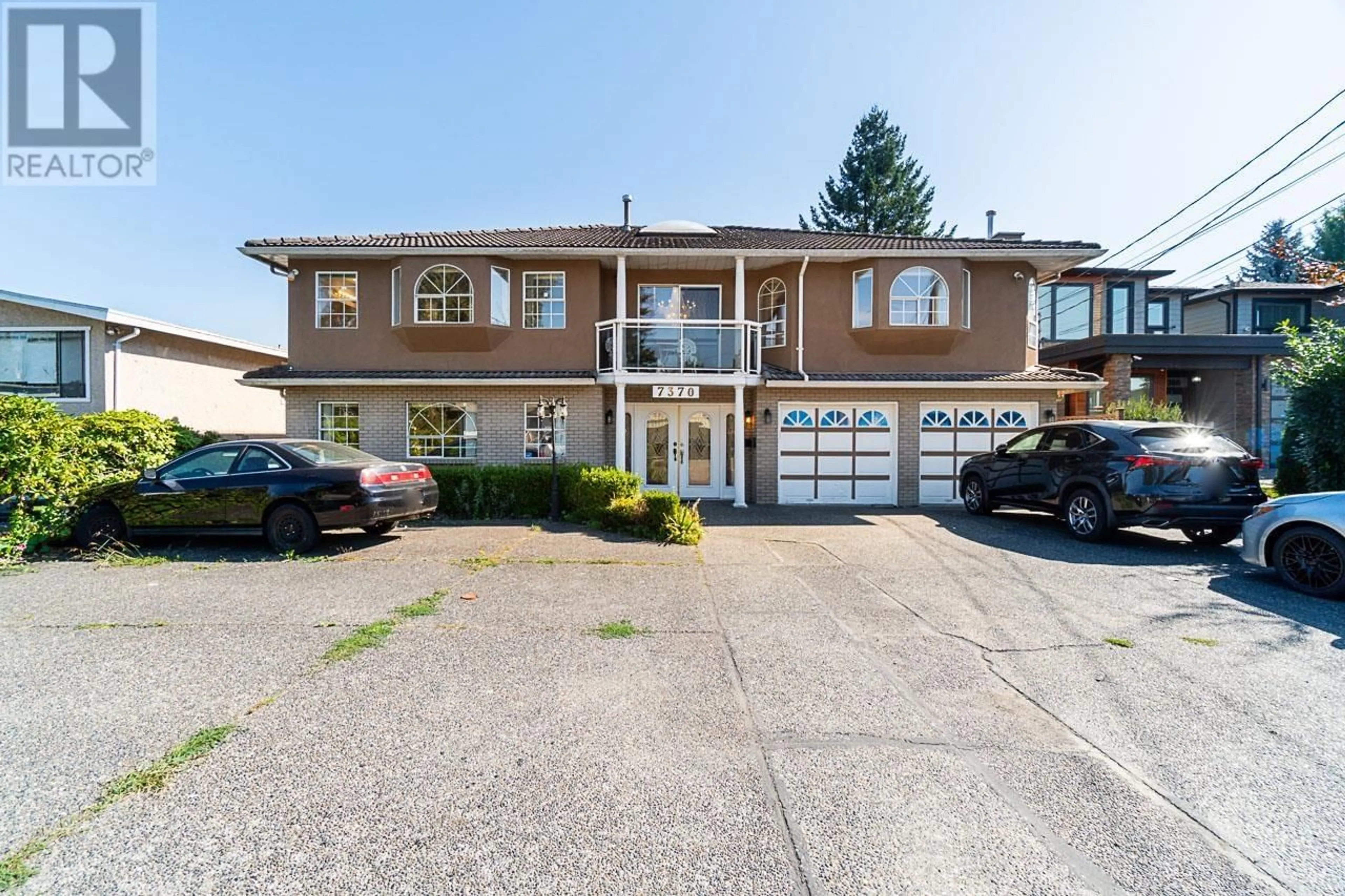 A pic from outside/outdoor area/front of a property/back of a property/a pic from drone, street for 7370 12 AVENUE, Burnaby British Columbia V3N2J9