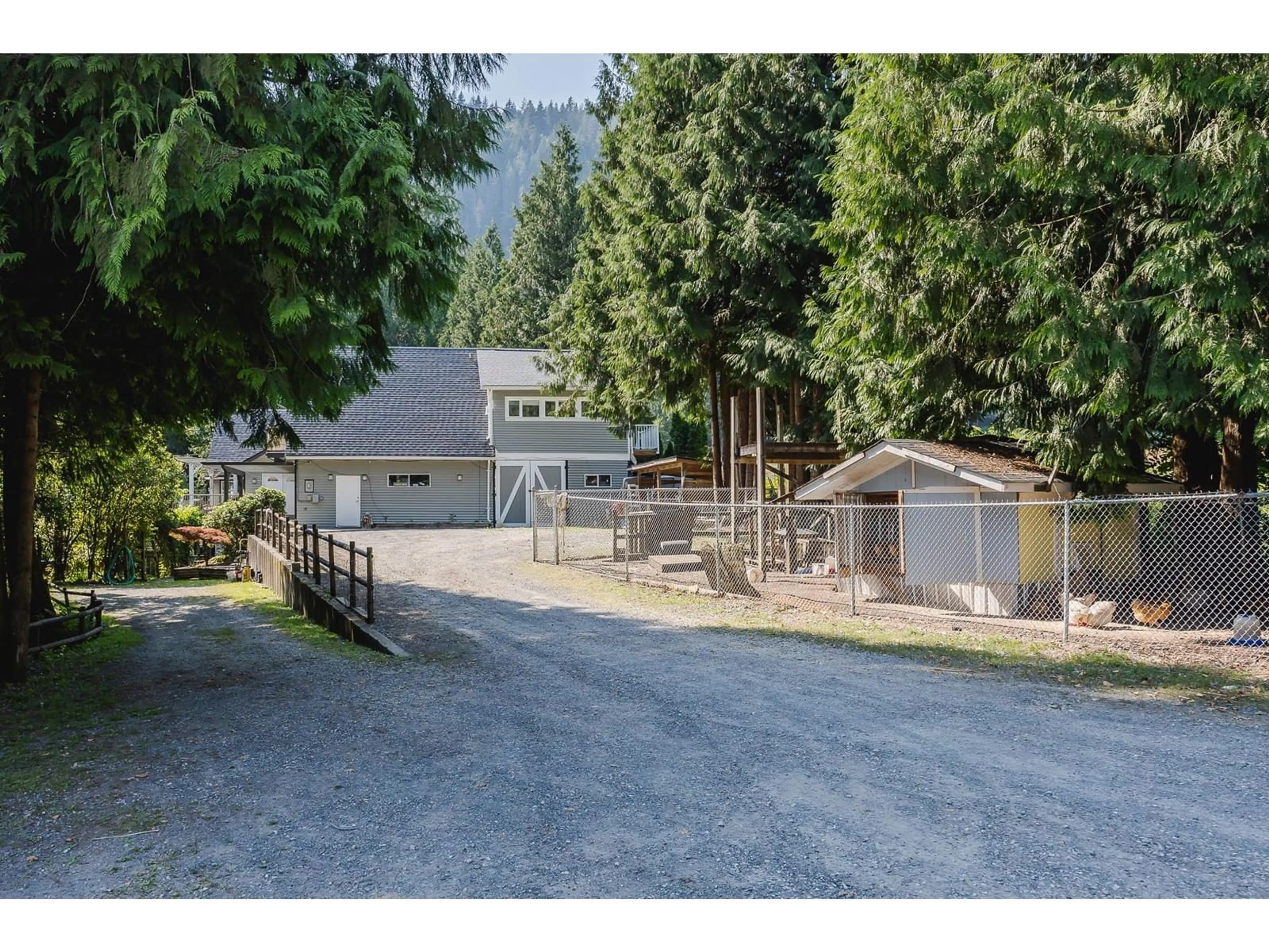 A pic from outside/outdoor area/front of a property/back of a property/a pic from drone, mountain view for 11977 STAVE LAKE, Mission British Columbia V2V4J1