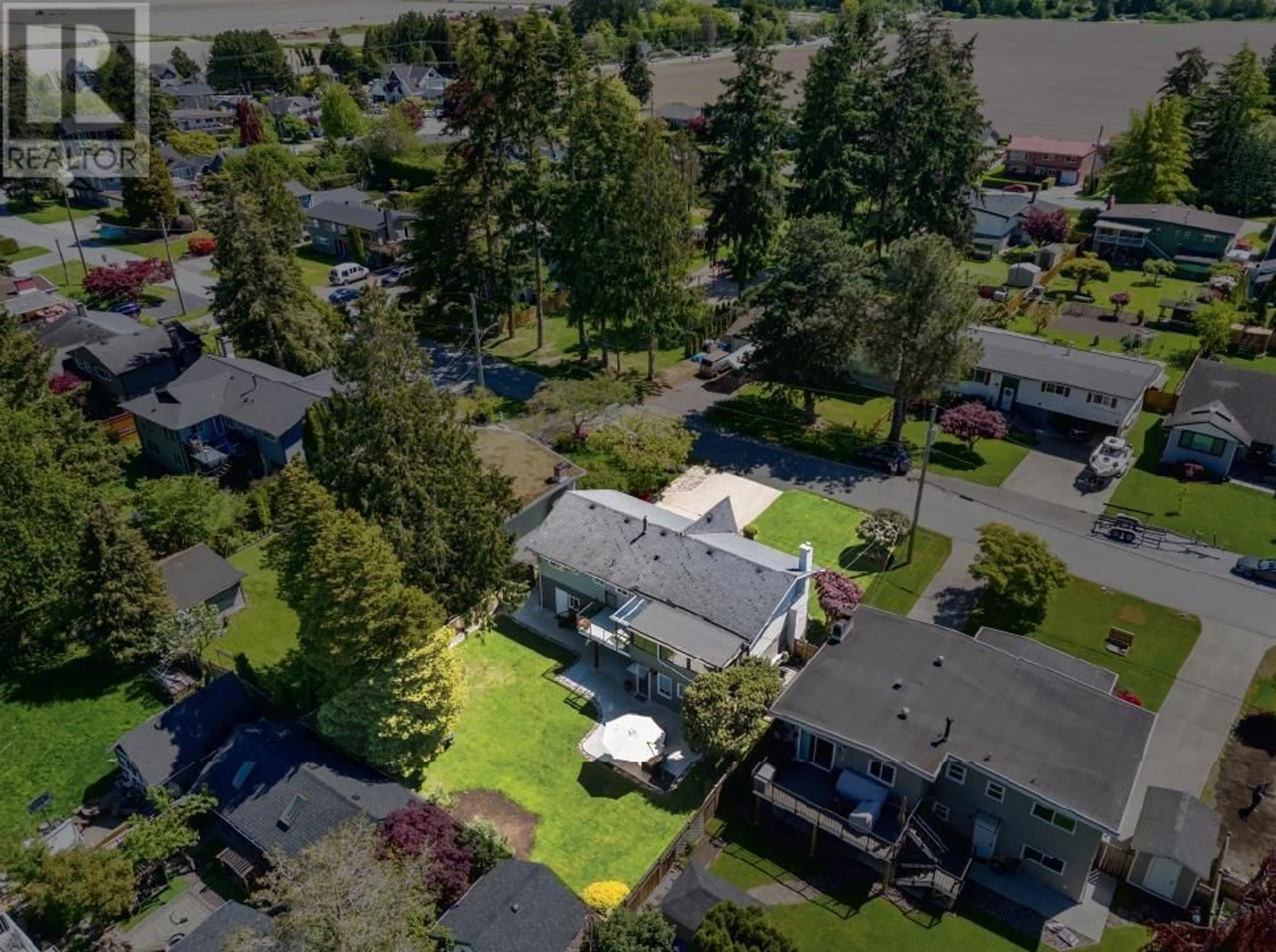 A pic from outside/outdoor area/front of a property/back of a property/a pic from drone, street for 5097 WHITWORTH CRESCENT, Ladner British Columbia V4K1B1