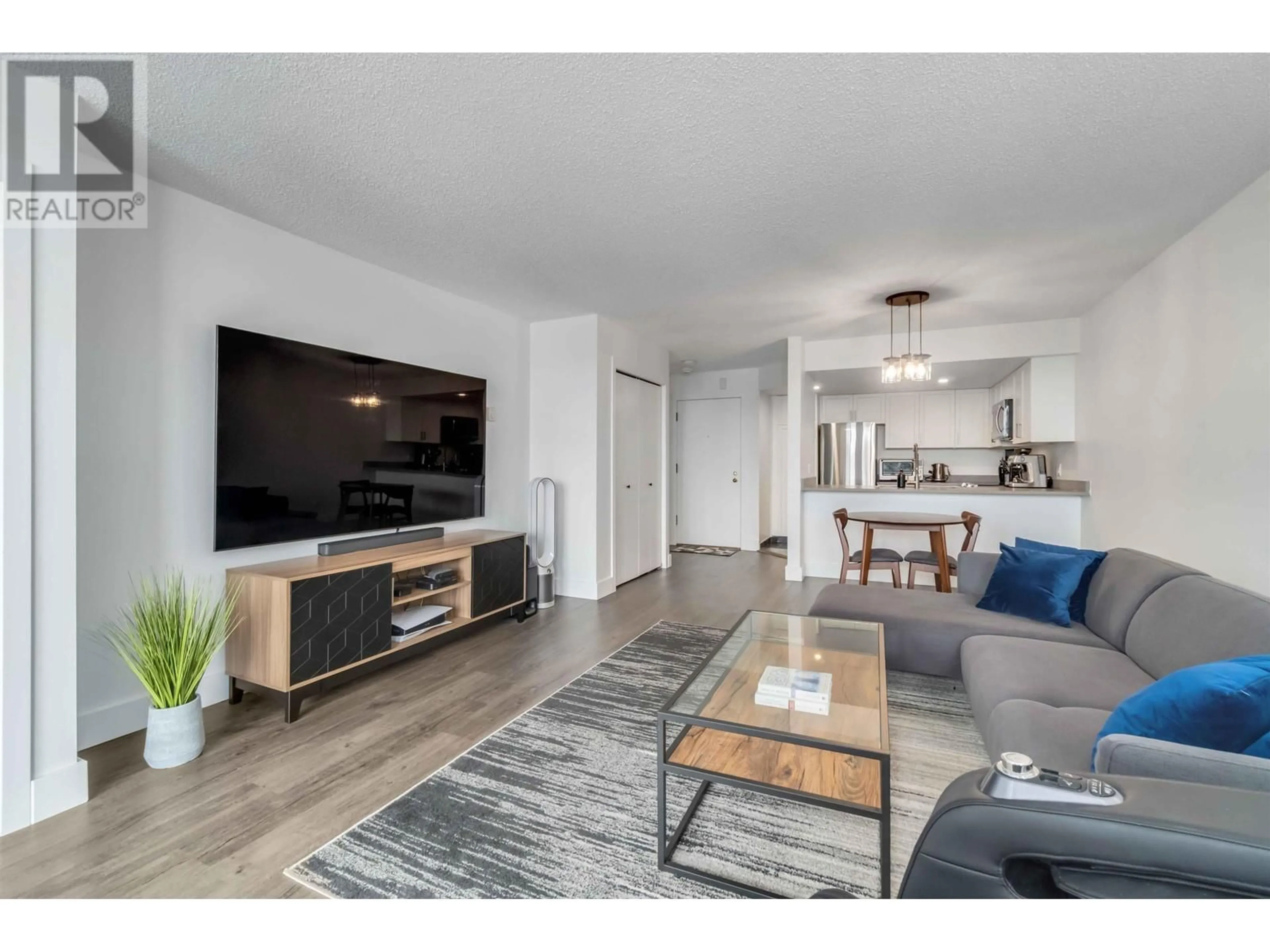 Living room with furniture, wood/laminate floor for 405 - 1045 QUAYSIDE DRIVE, New Westminster British Columbia V3M6C9