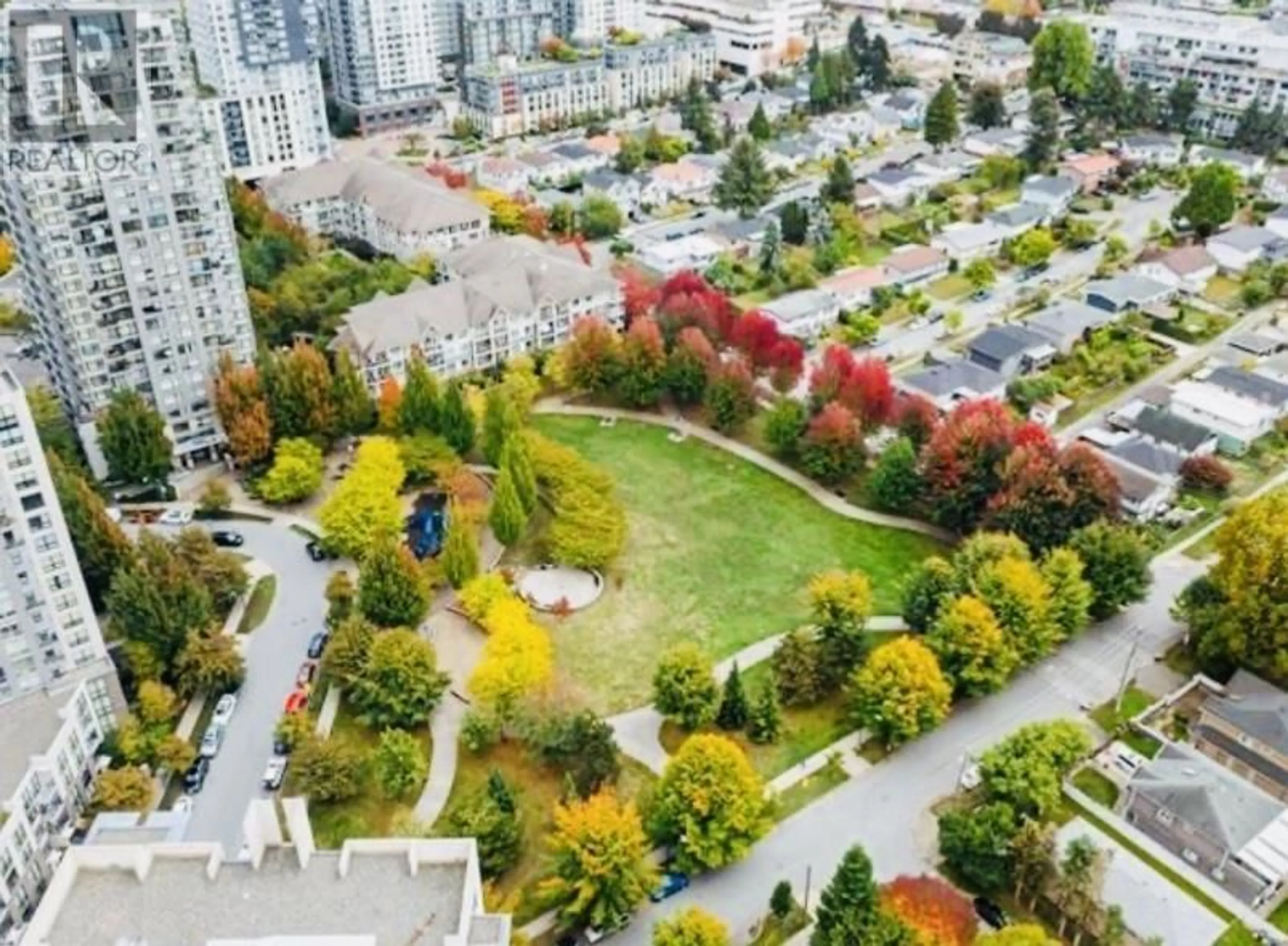 A pic from outside/outdoor area/front of a property/back of a property/a pic from drone, unknown for 215 - 3663 CROWLEY DRIVE, Vancouver British Columbia V5R6H4