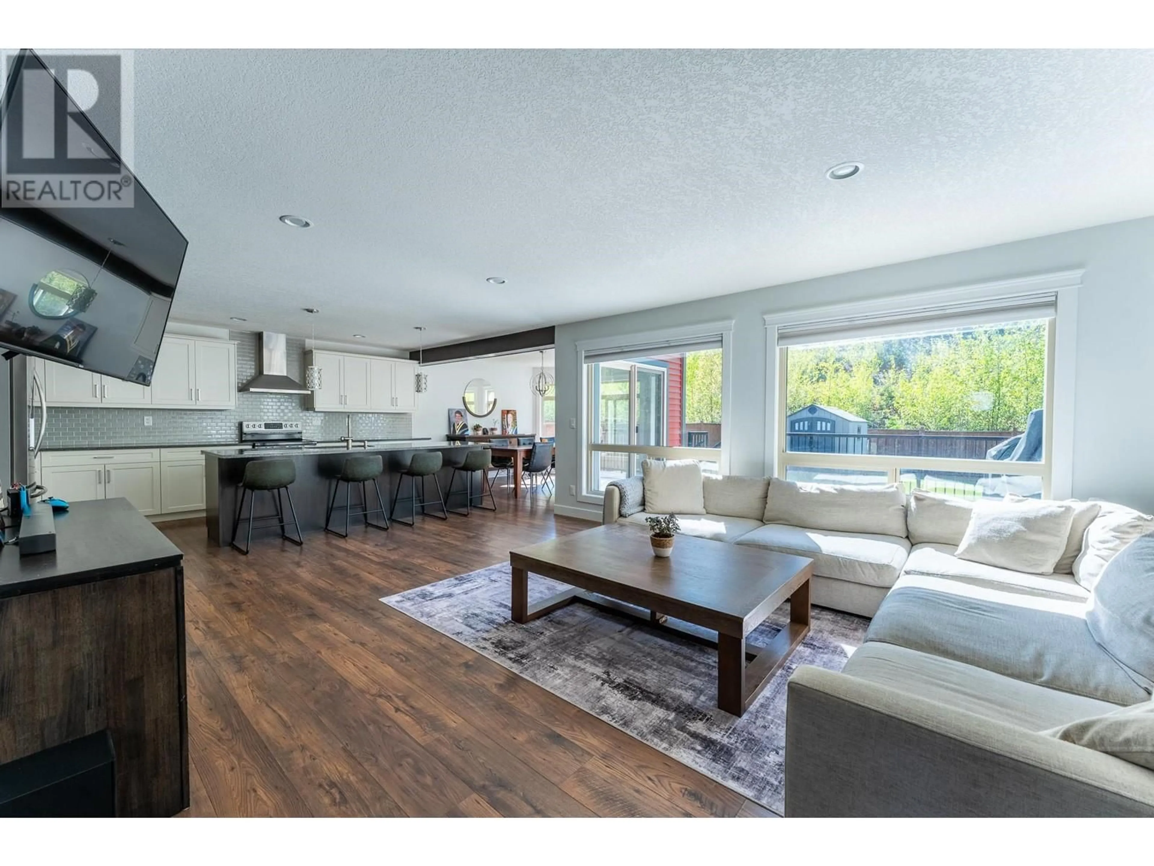 Open concept kitchen, wood/laminate floor for 7675 STILLWATER CRESCENT, Prince George British Columbia V2N0C2
