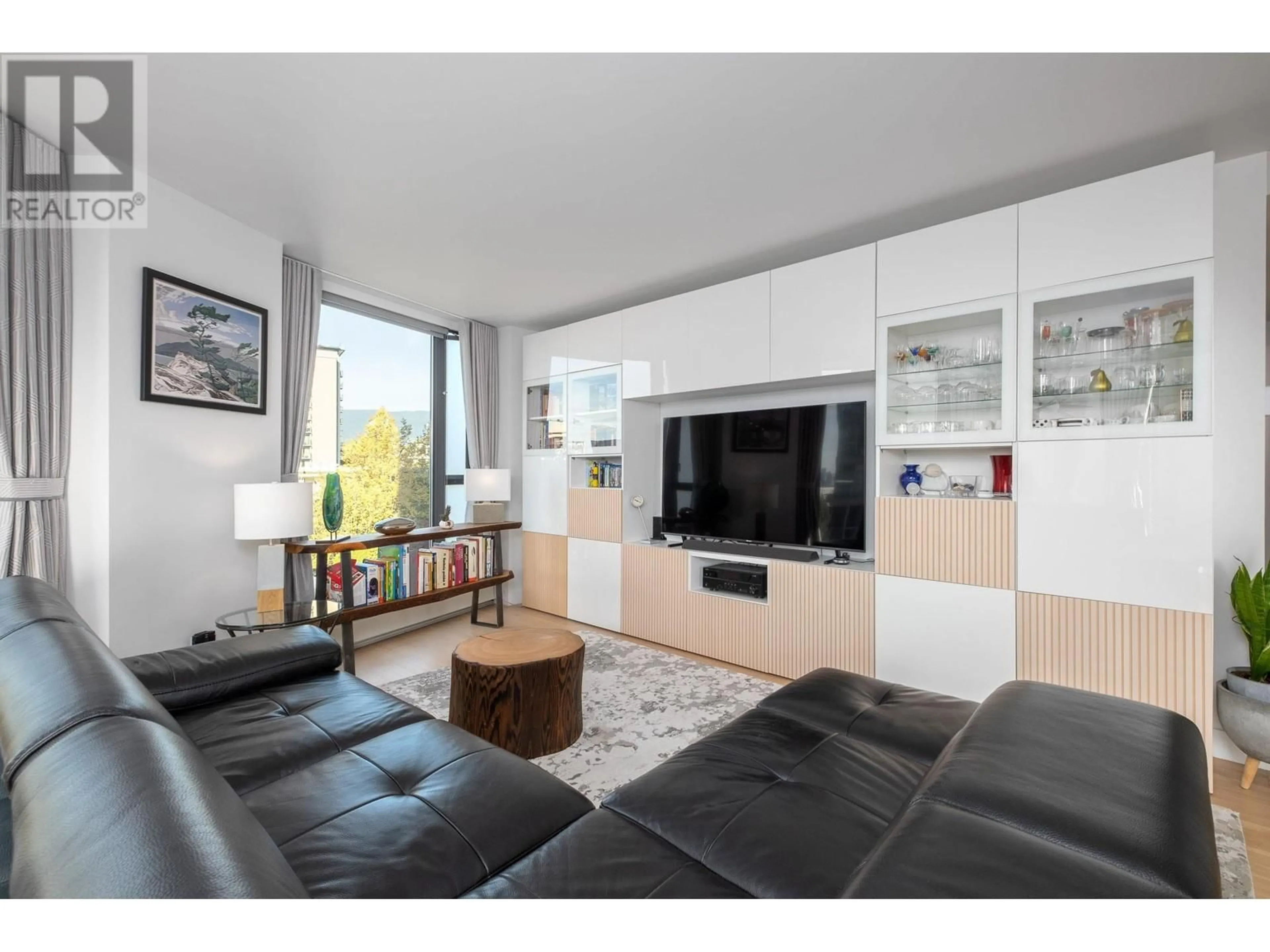 Living room with furniture, wood/laminate floor for 502 - 120 2ND STREET, North Vancouver British Columbia V7M1C3
