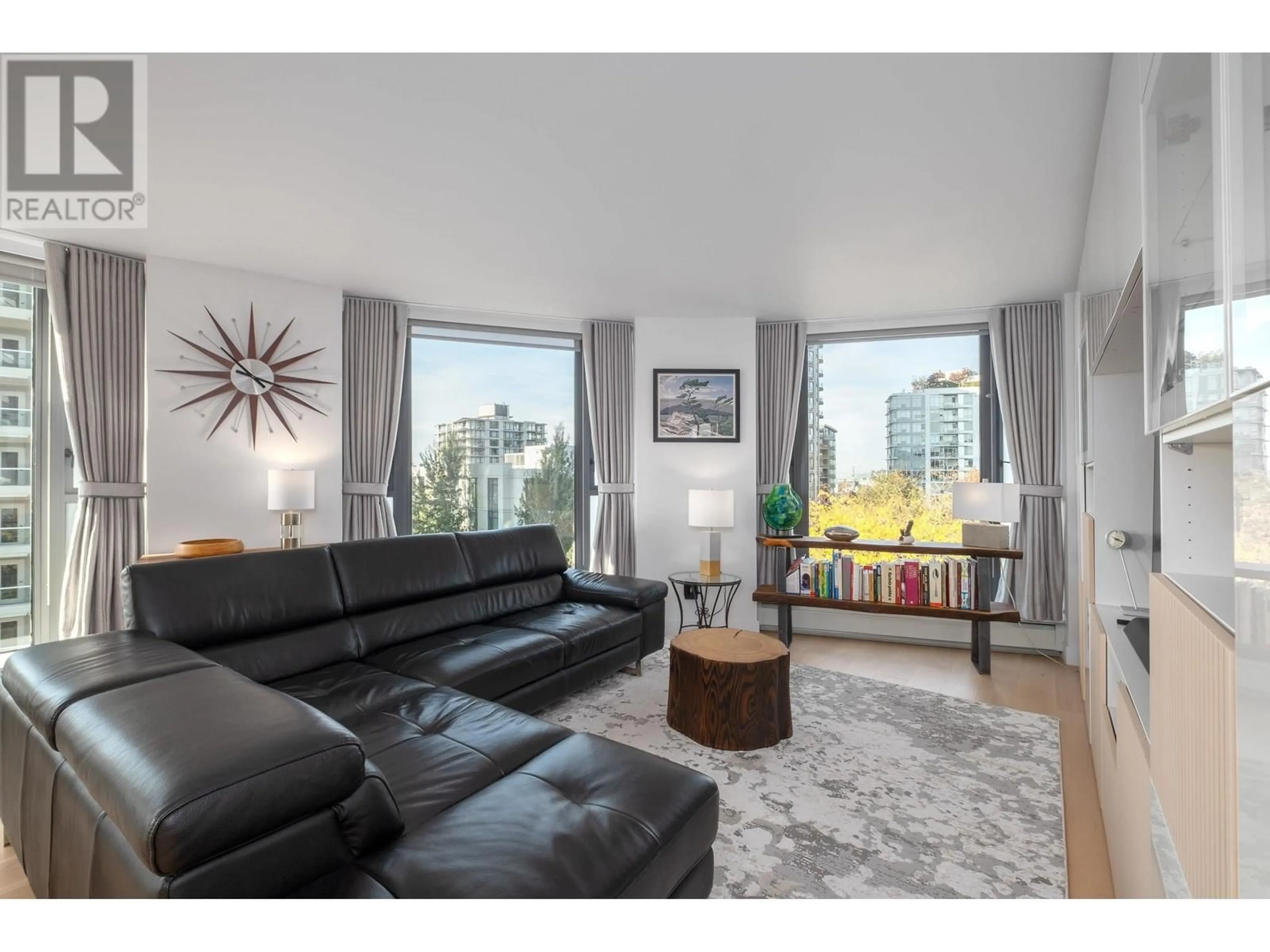 Living room with furniture, wood/laminate floor for 502 - 120 2ND STREET, North Vancouver British Columbia V7M1C3