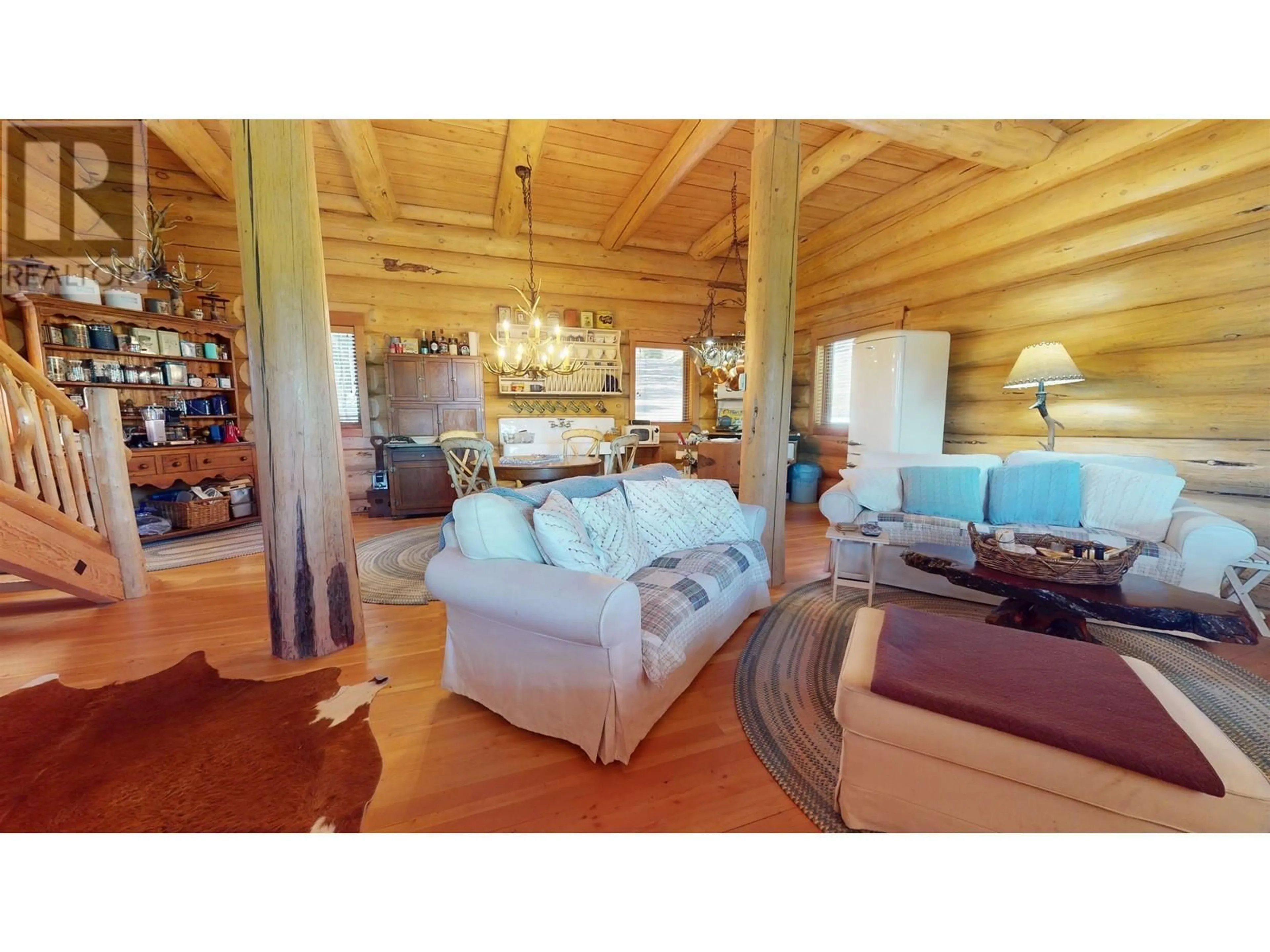Living room with furniture, wood/laminate floor for 4095 BLUEBIRD ROAD, Canim Lake British Columbia V0K1J0