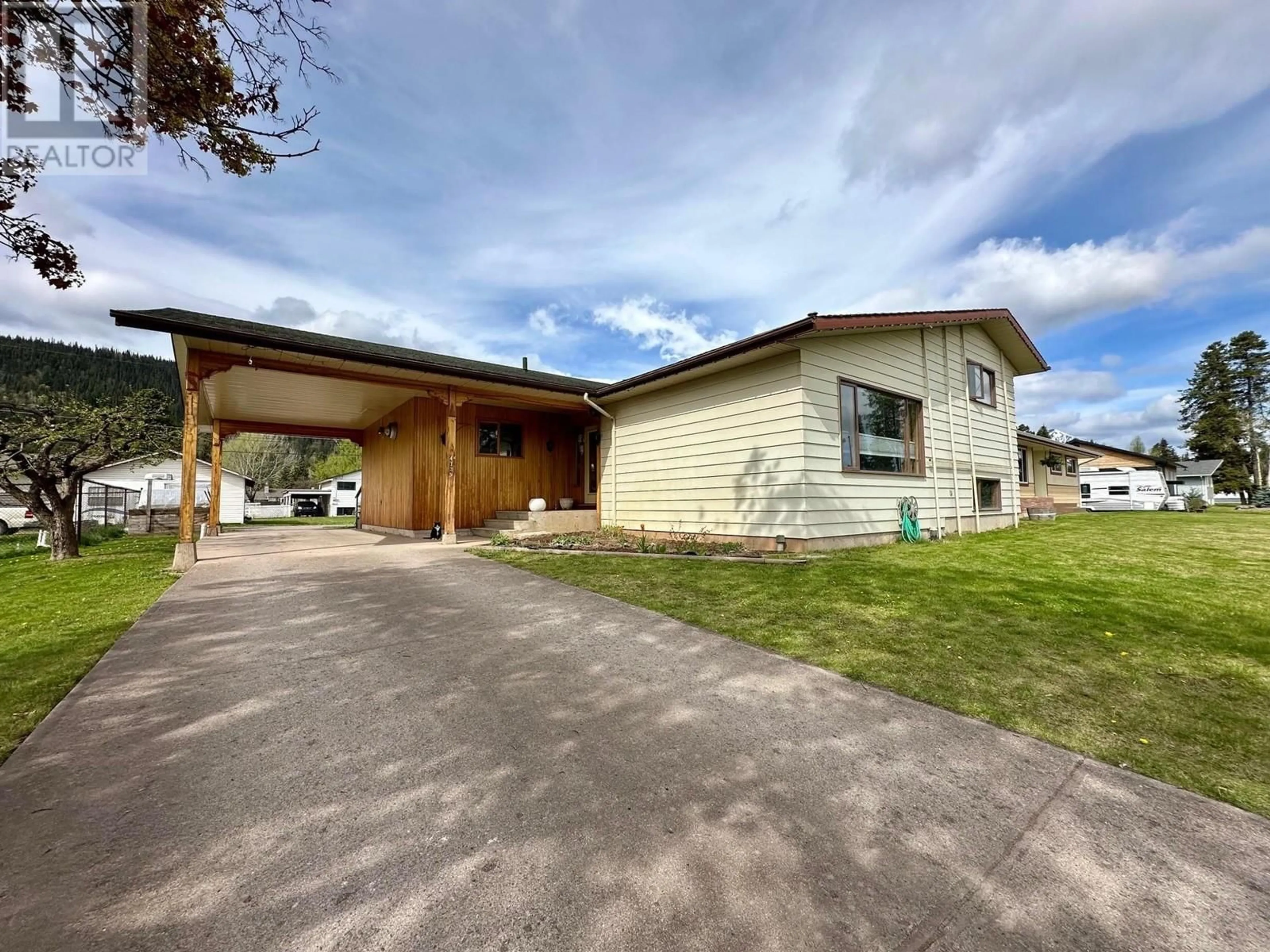 A pic from outside/outdoor area/front of a property/back of a property/a pic from drone, street for 4139 FIRST AVENUE, Smithers British Columbia V0J2N0